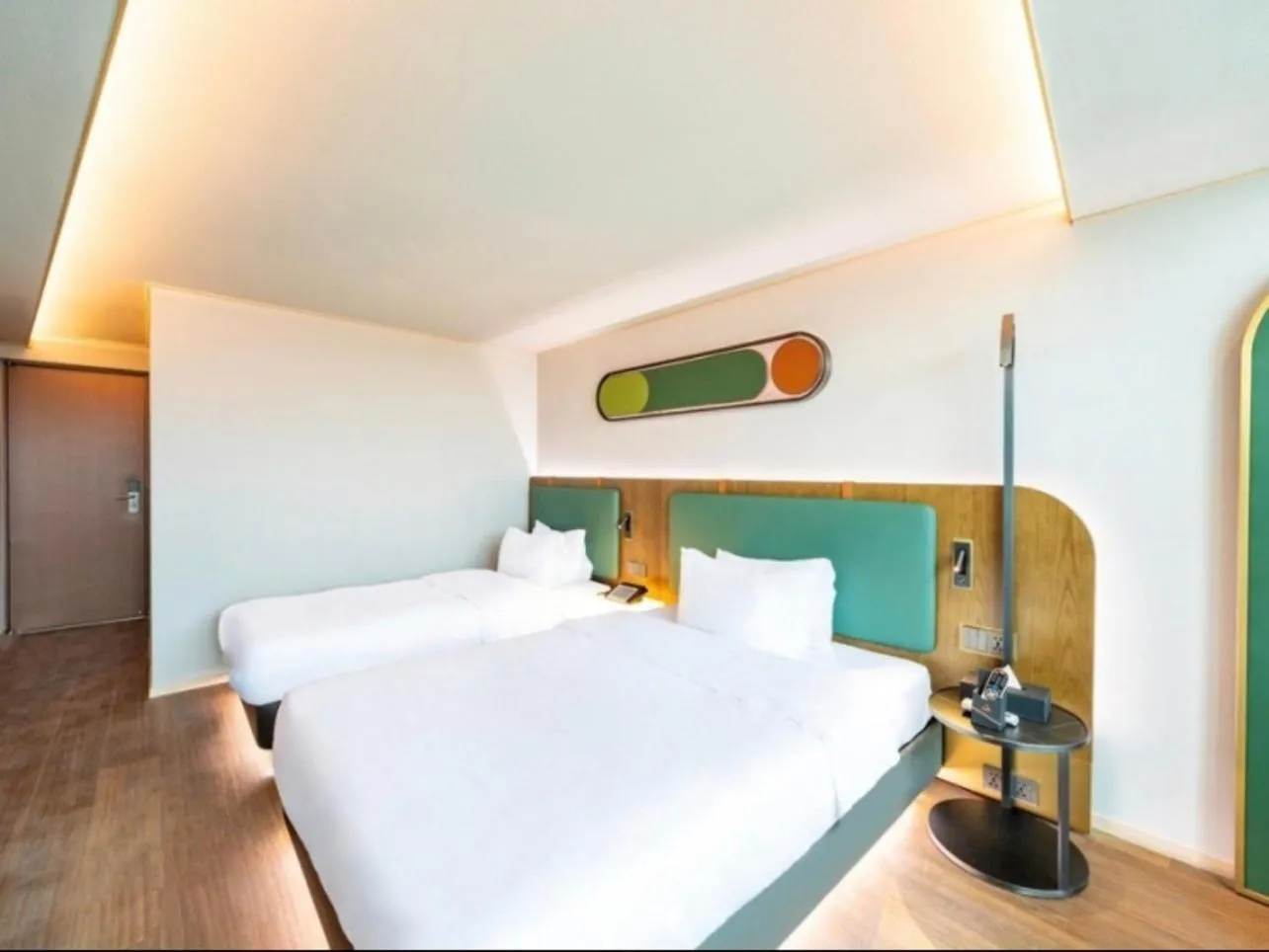 Bed in L&L Central Hotel