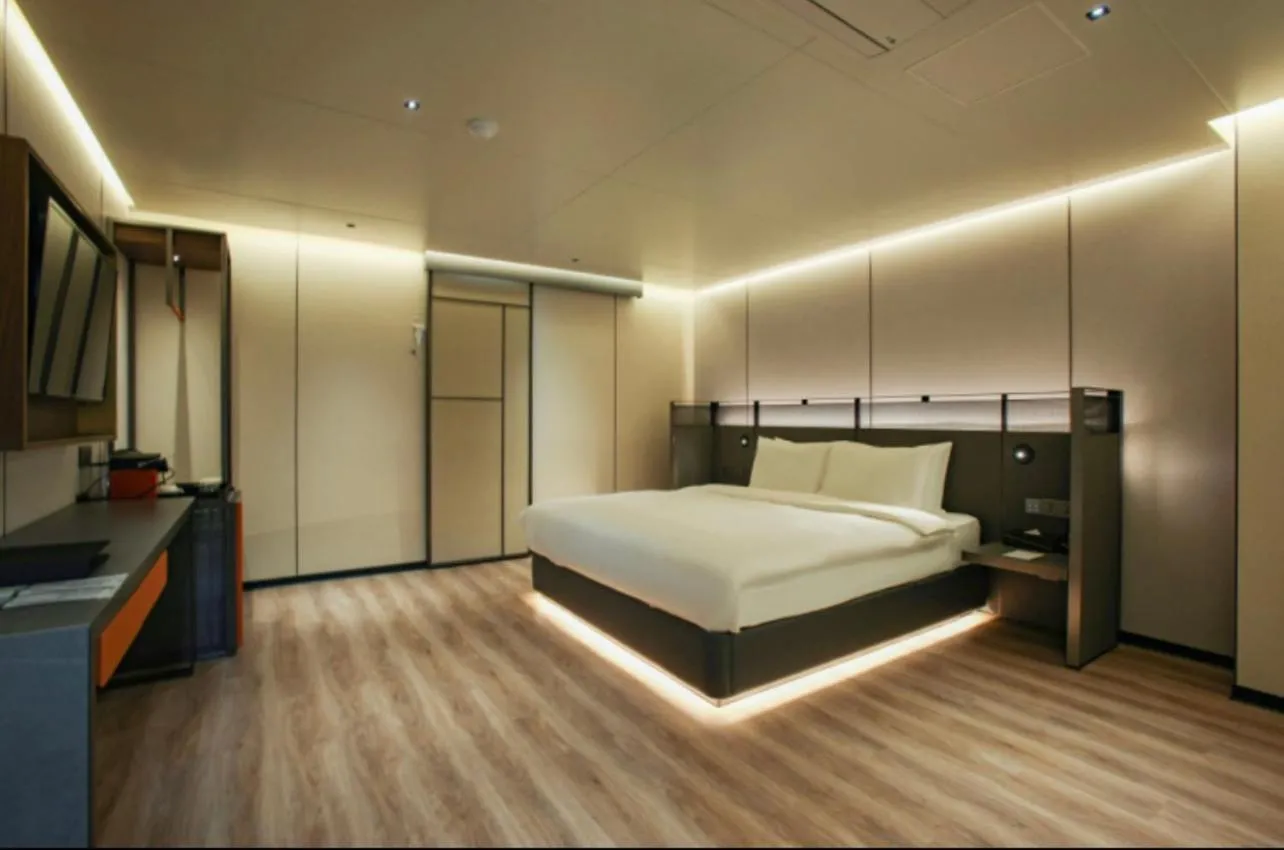 Bed in L&L City Hotel