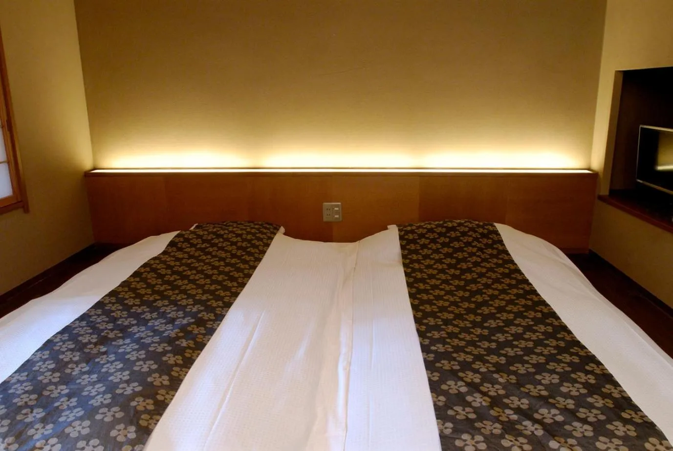 Bed in Ryokan Sumiya Kihoan