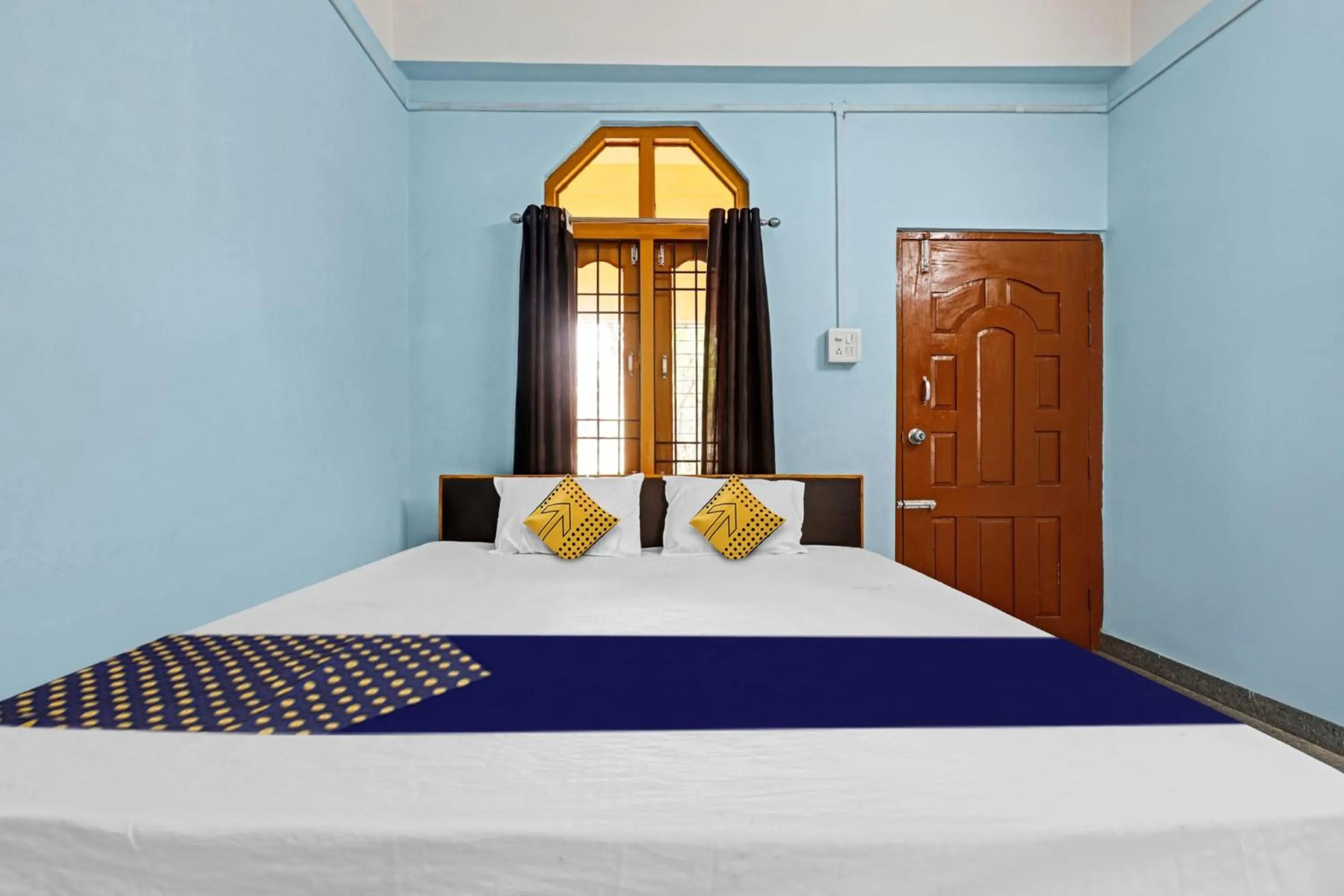 Bedroom, Bed in Hotel O Garam Masala Residency