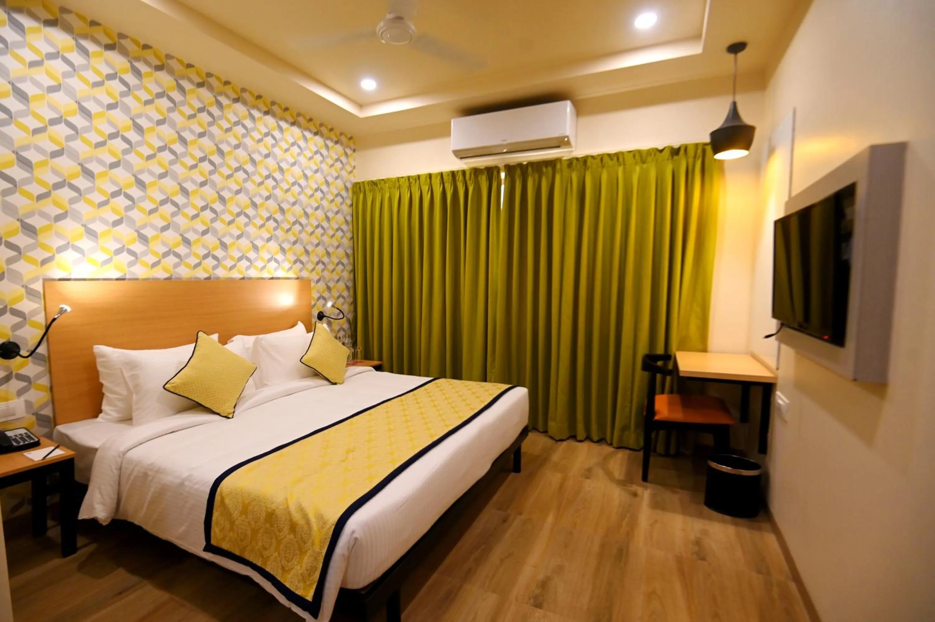 Bedroom, Bed in Regenta Inn Bannerghatta Bangalore