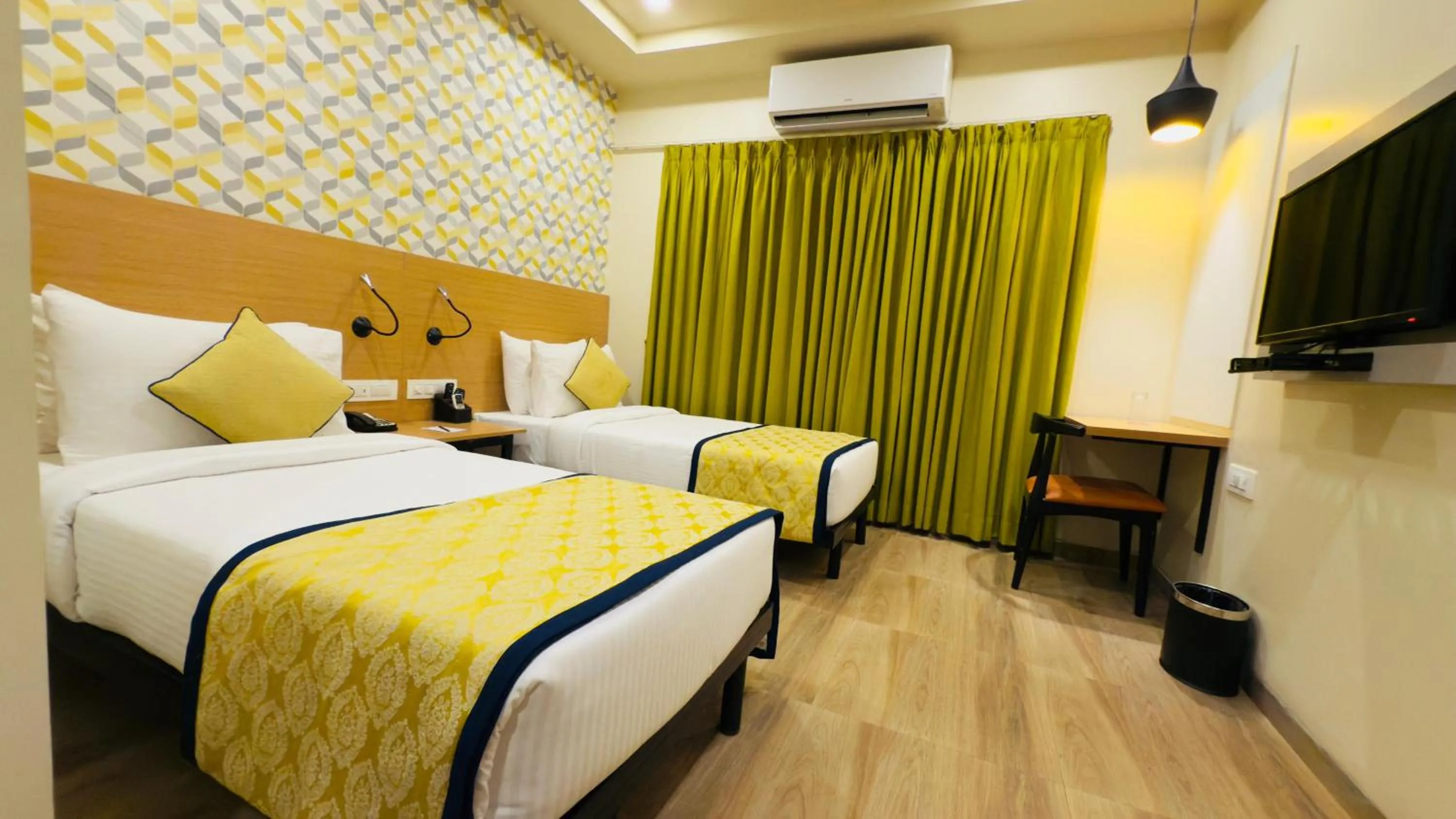 Bedroom, Bed in Regenta Inn Bannerghatta Bangalore