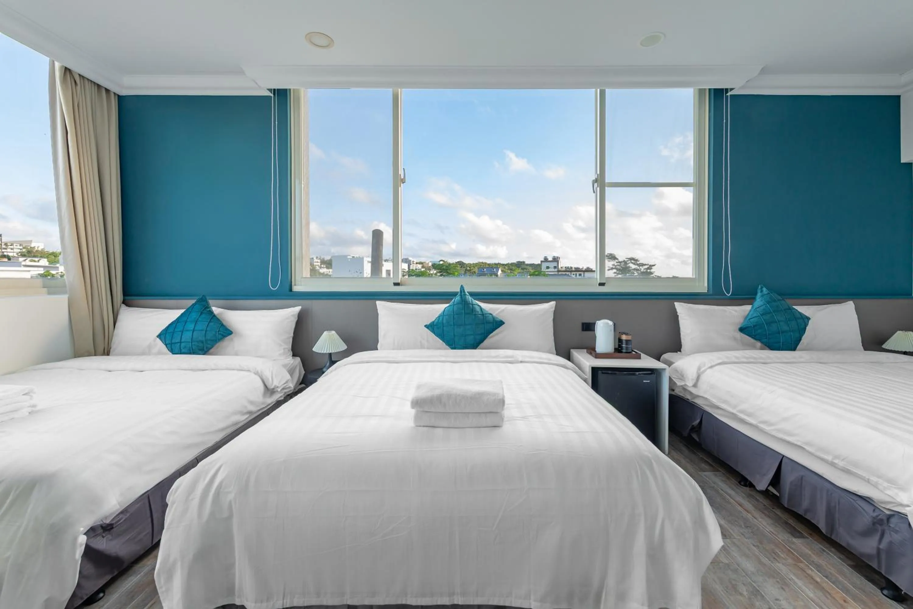 Bed in Sunset Mu Style Inn