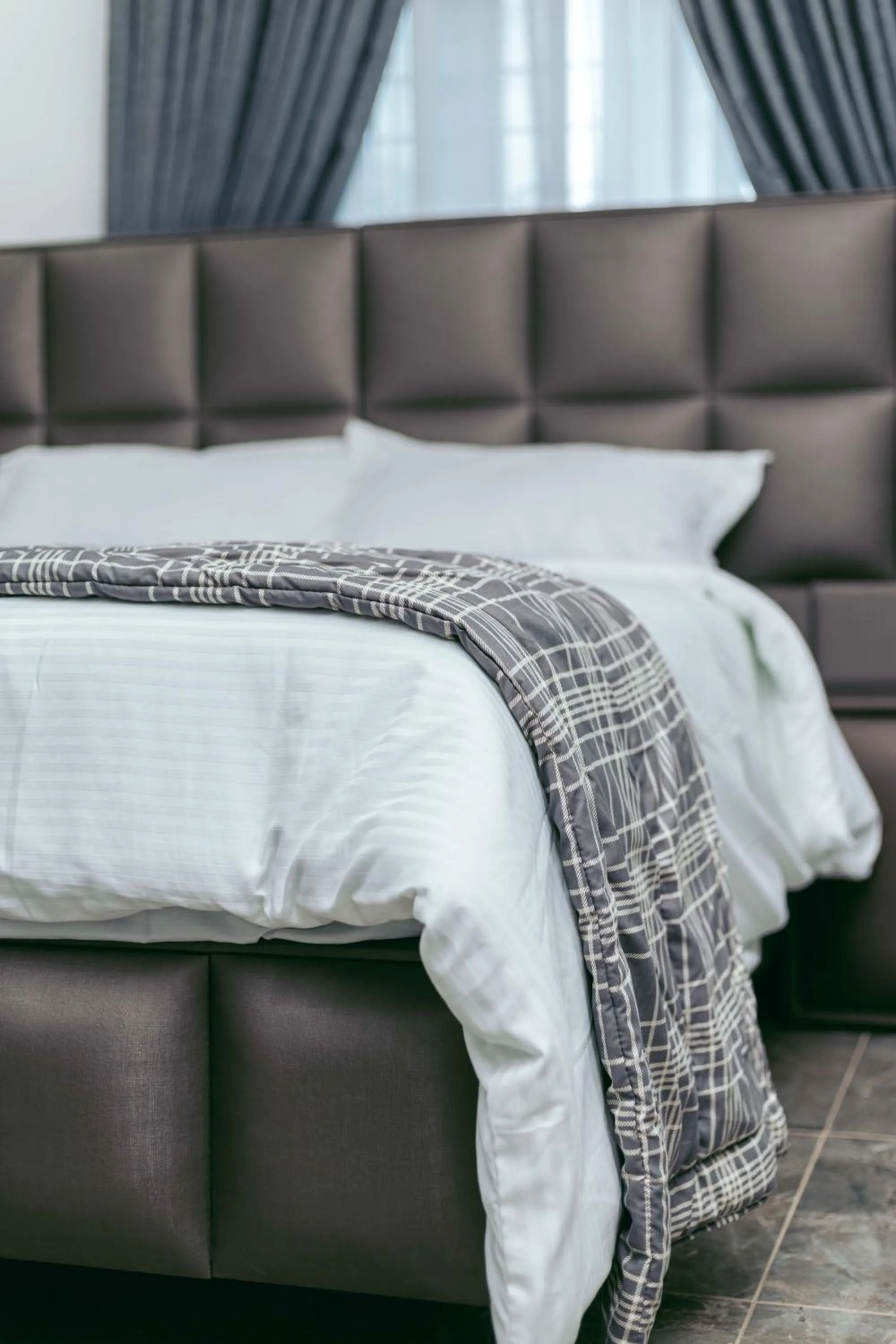 Bed in Phoenix Luxury Apartments