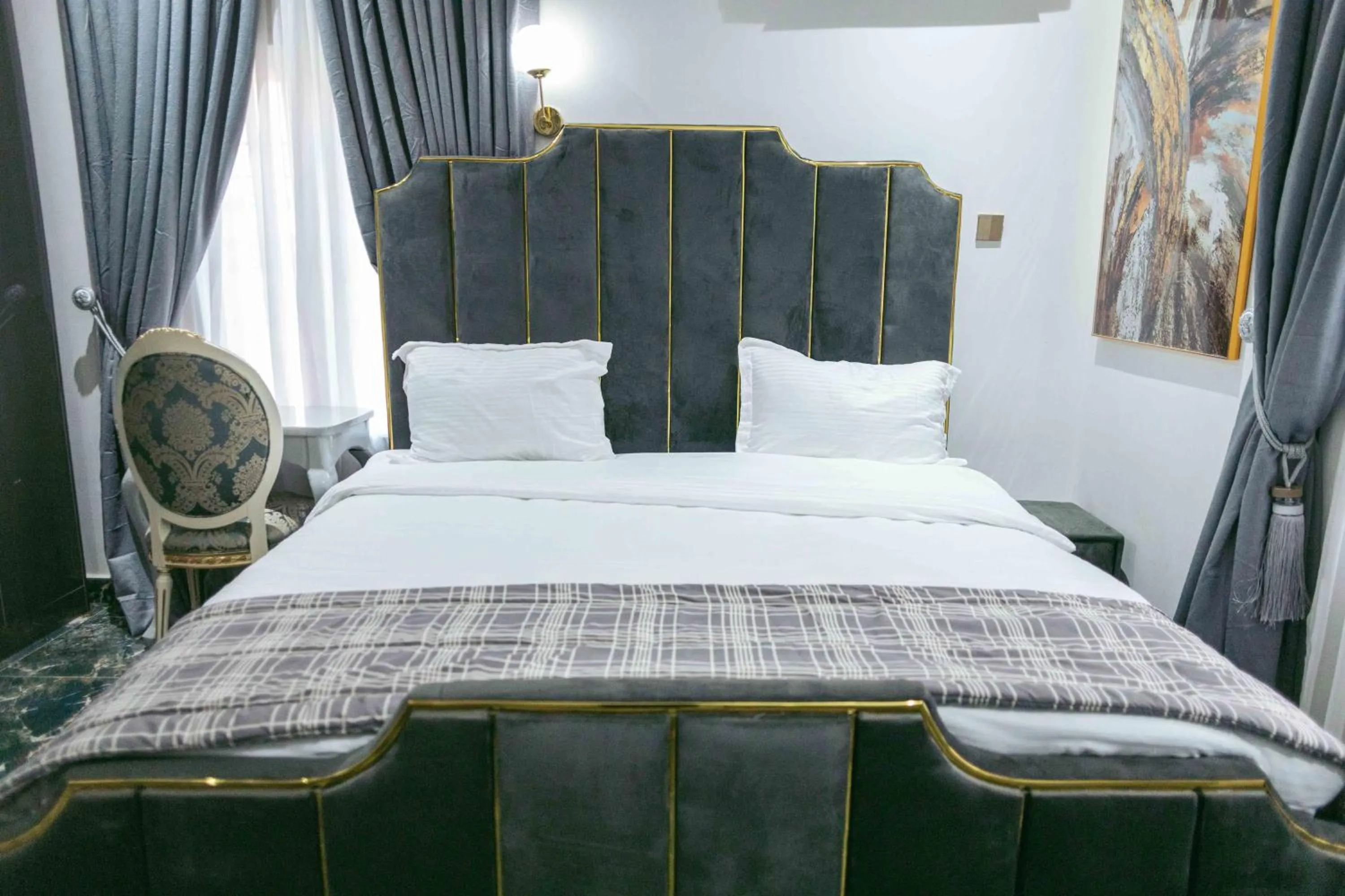 Bed in Phoenix Luxury Apartments