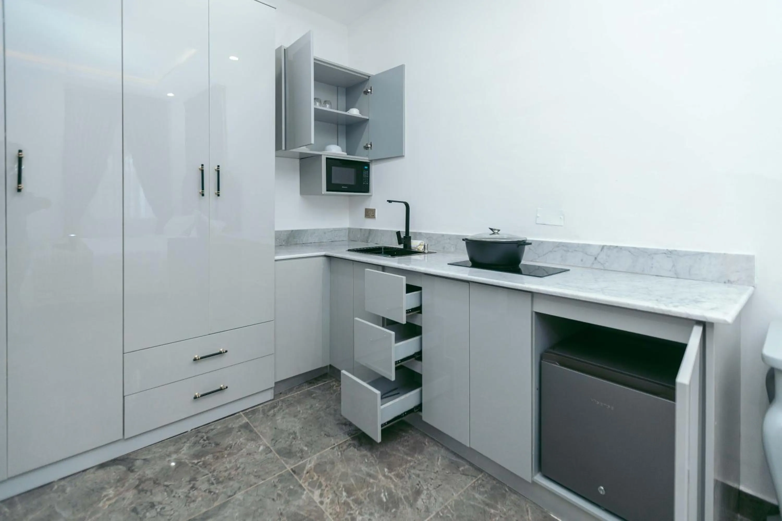 Kitchen or kitchenette in Phoenix Luxury Apartments