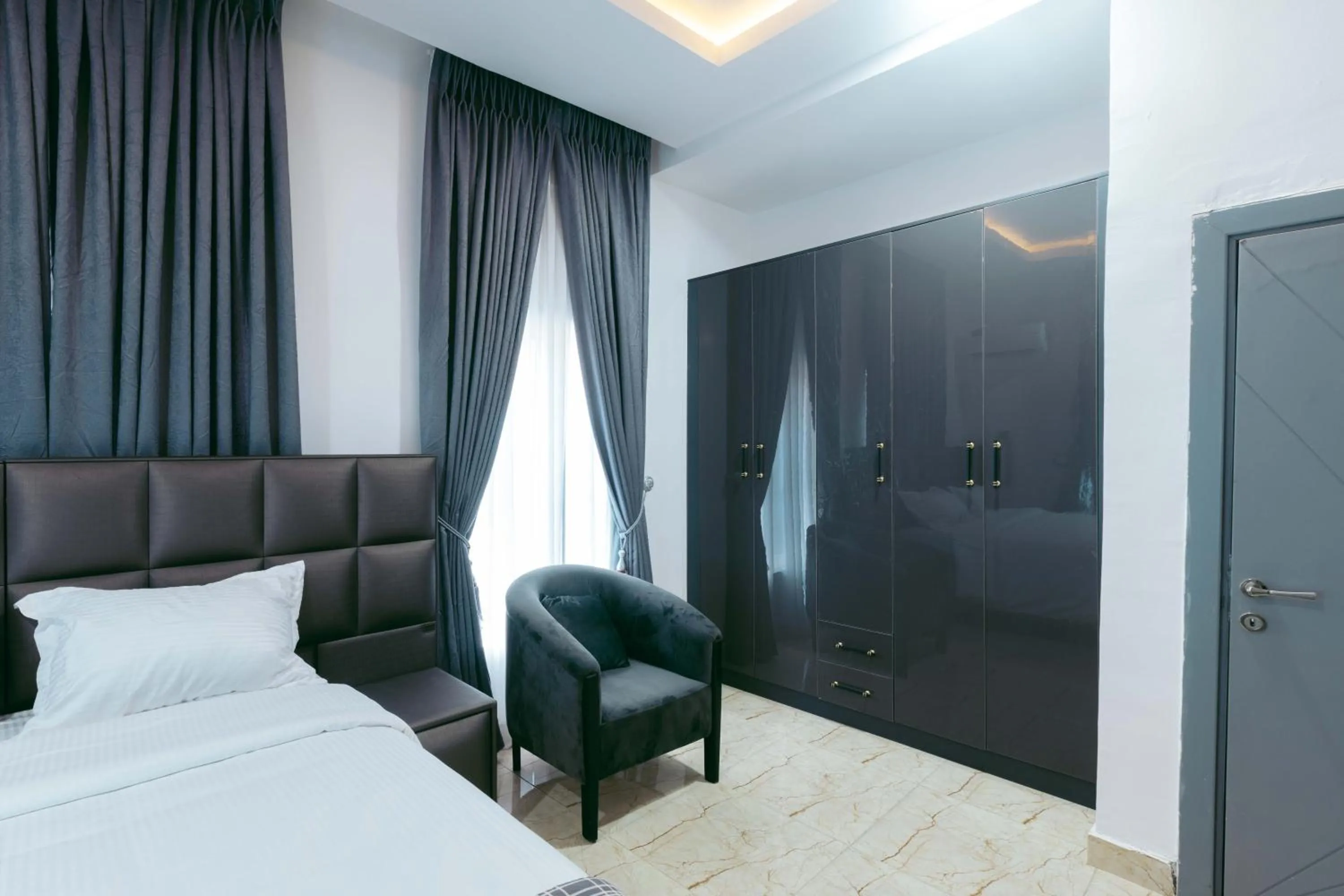 Bed in Phoenix Luxury Apartments