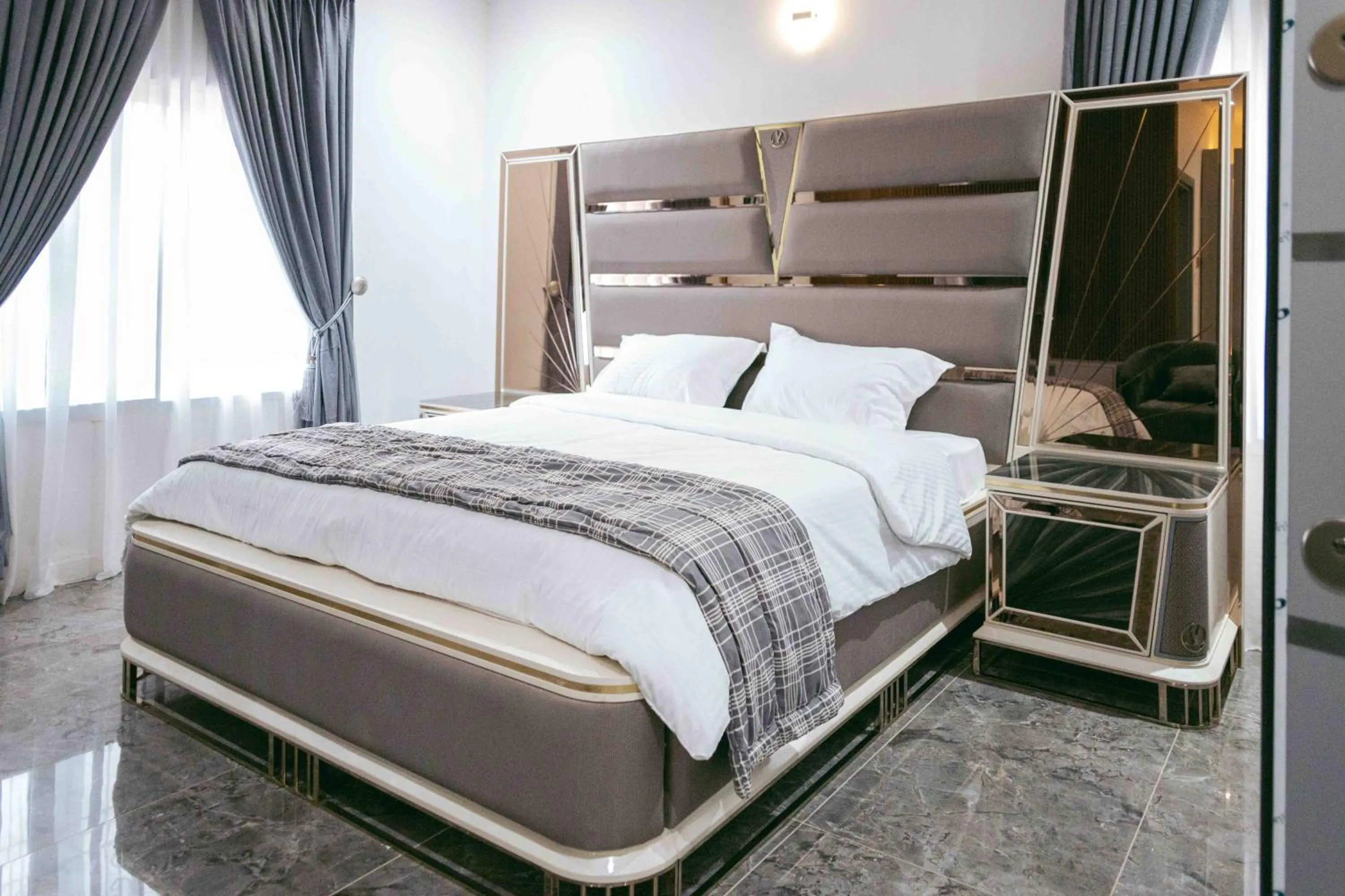 Bed in Phoenix Luxury Apartments