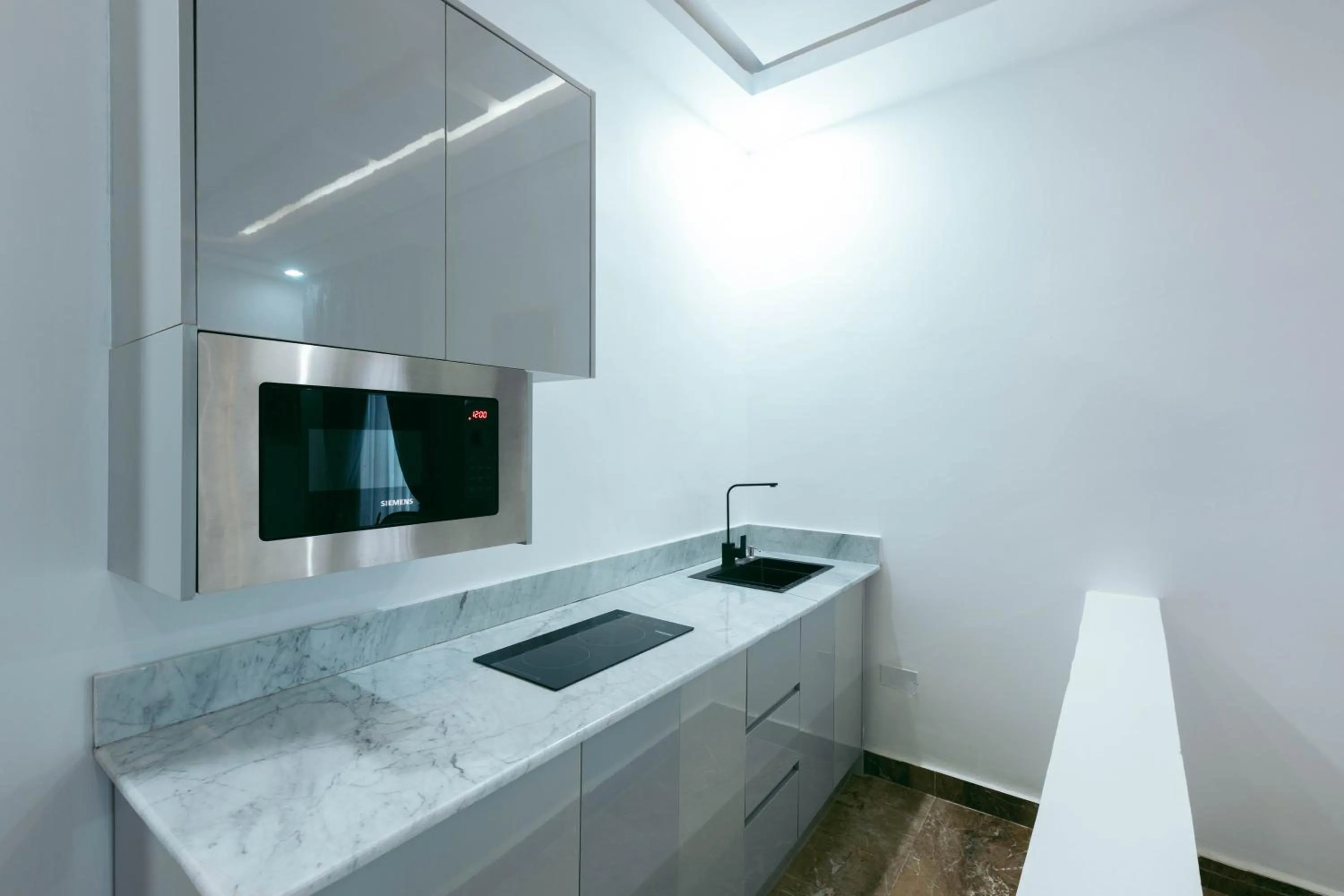 Kitchen or kitchenette in Phoenix Luxury Apartments