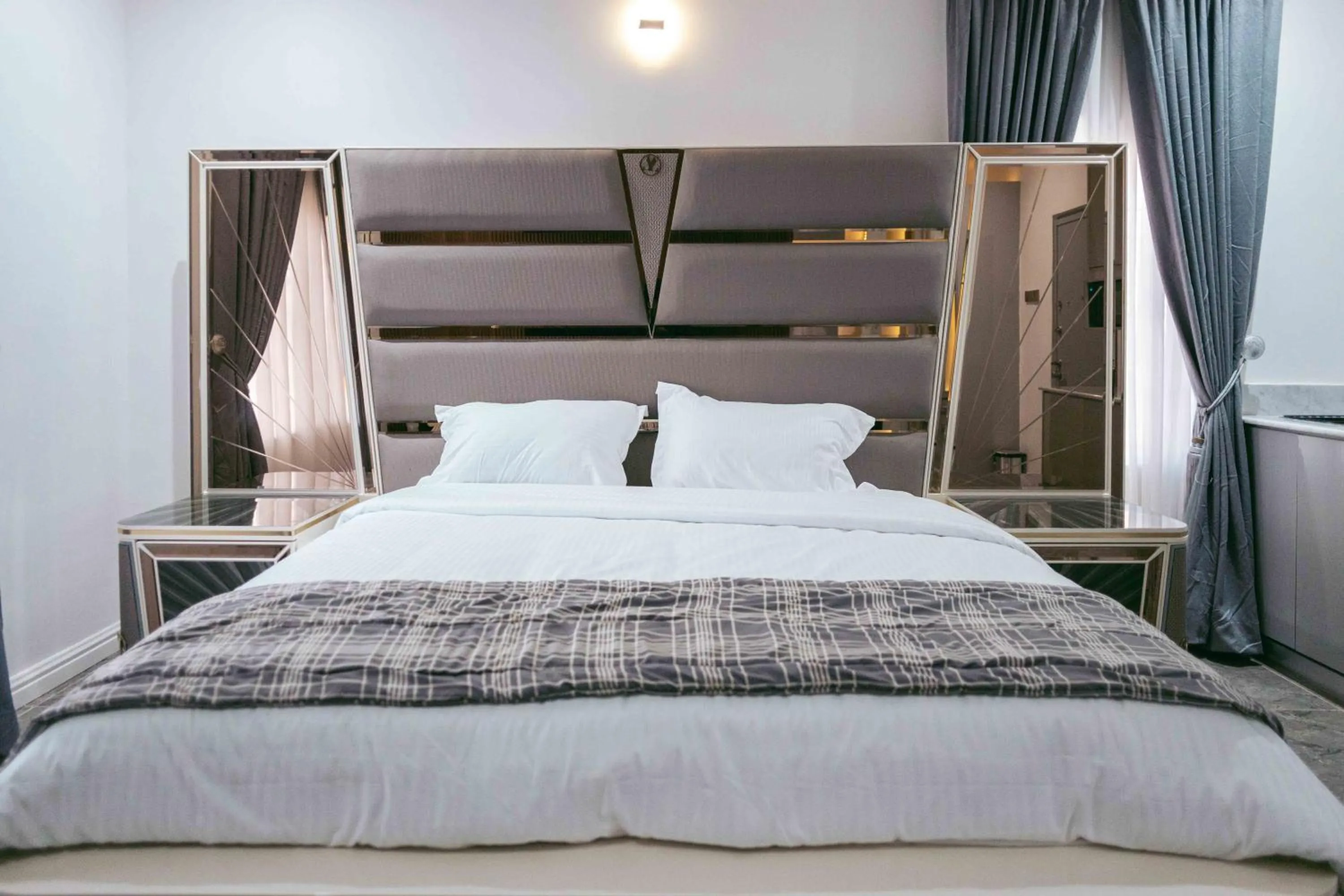 Bed in Phoenix Luxury Apartments