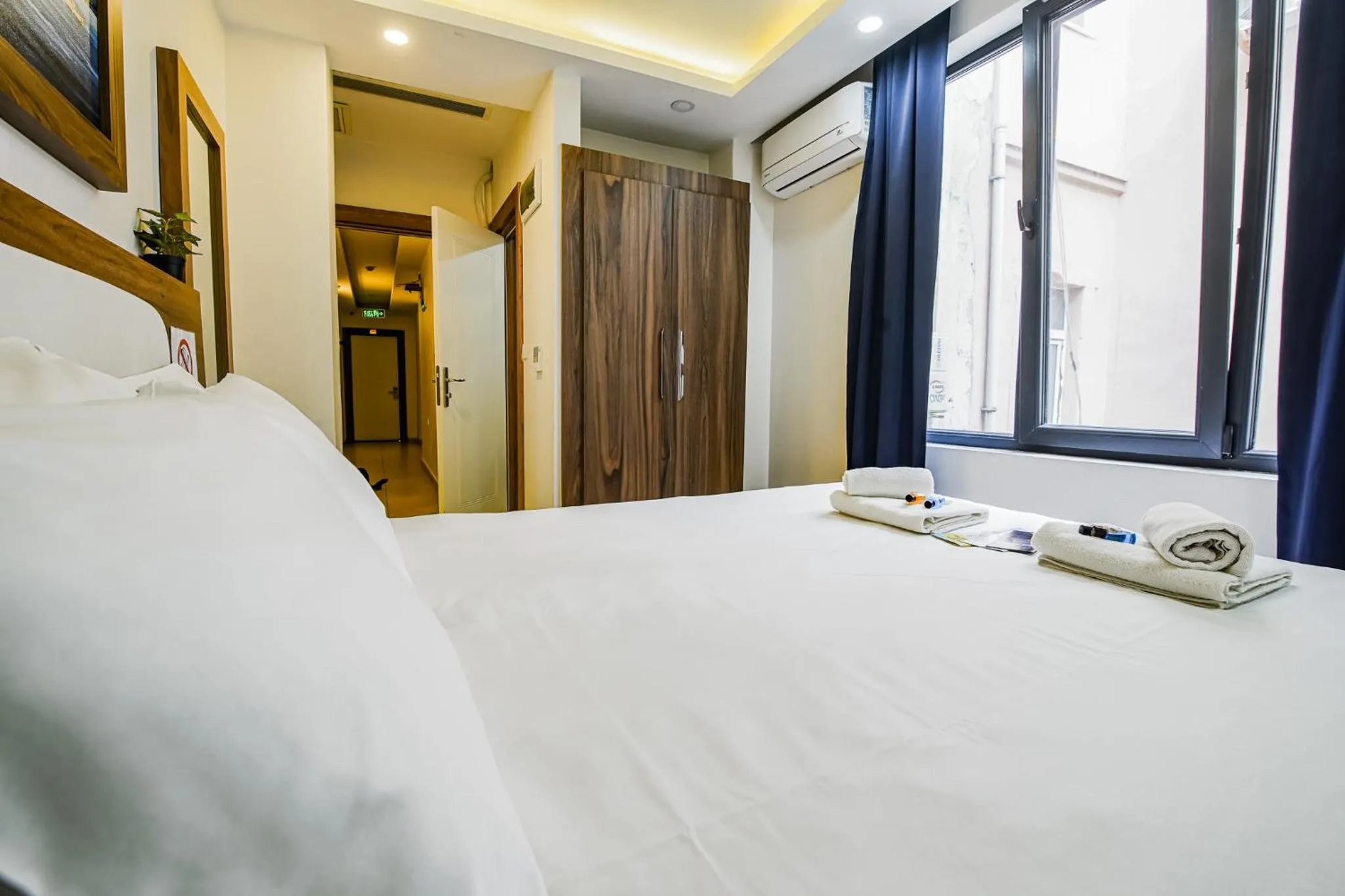 Bed in MITANI SUITES