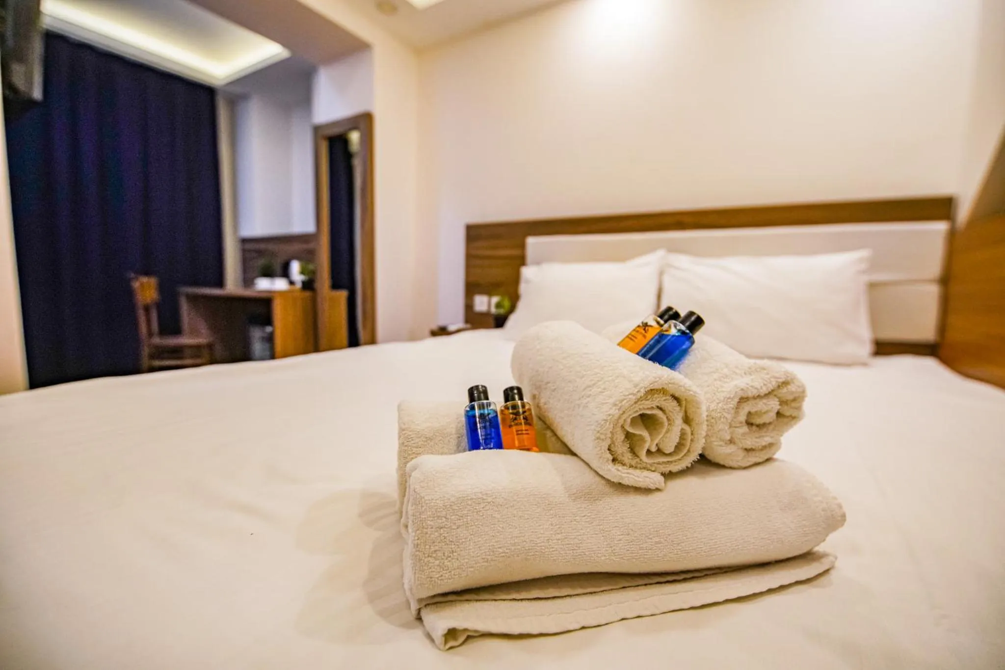 Bed in MITANI SUITES