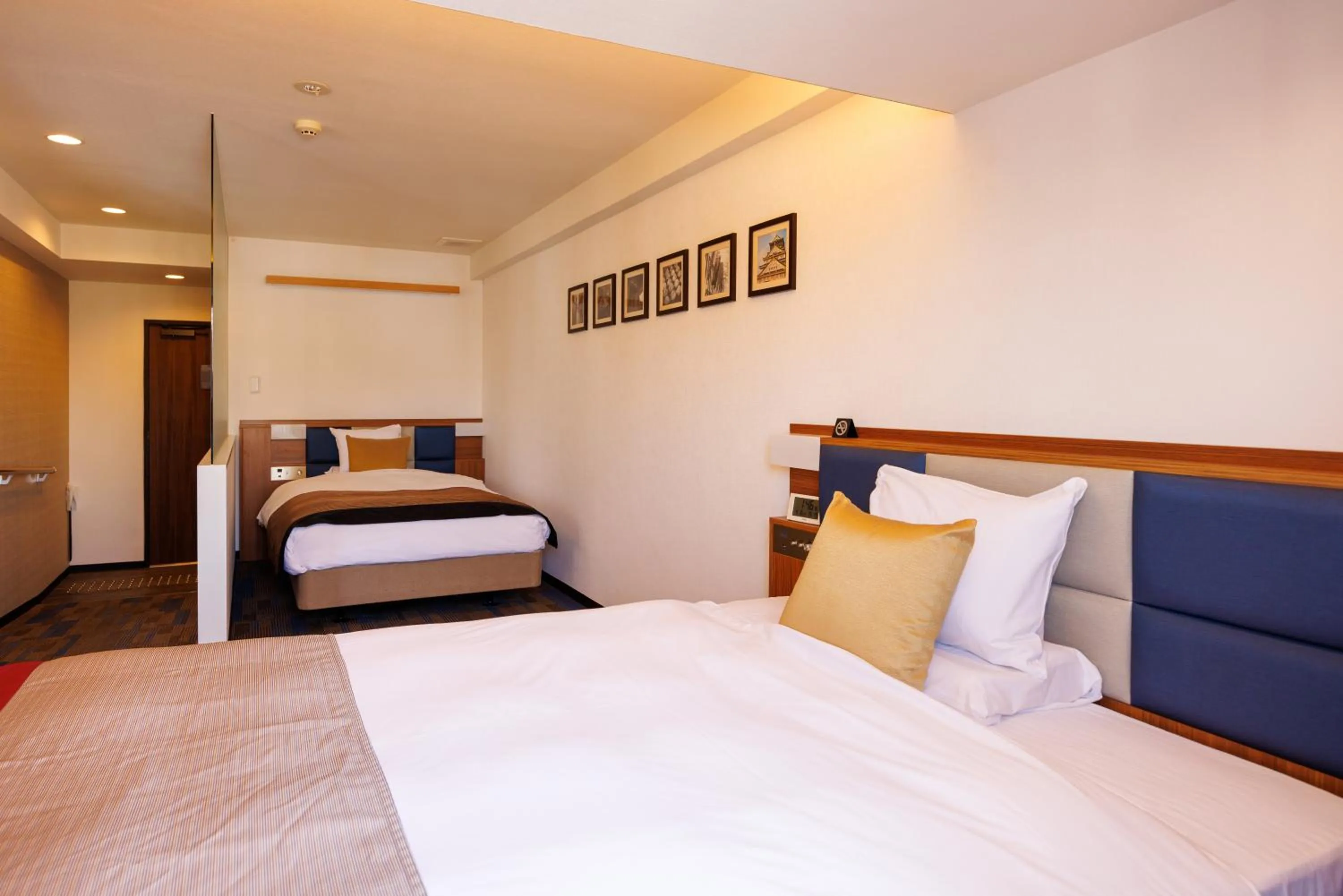 Bed in Floral Hotel East Shinsaibashi