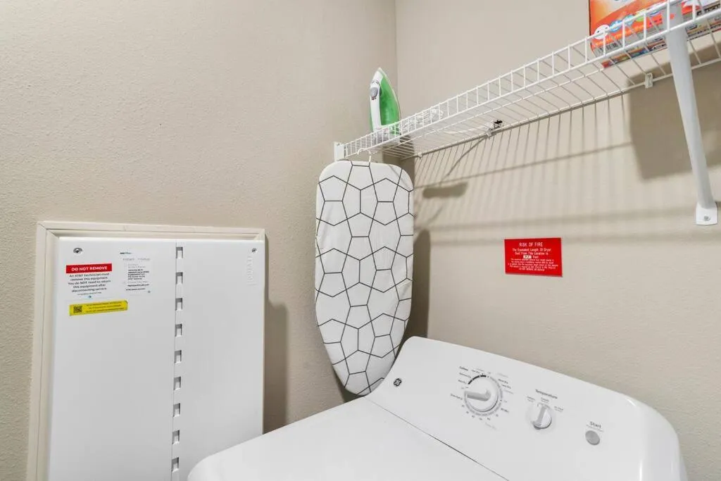 Bed in Elegant 1BR/1BA Condo with Pool, Gym and Laundry