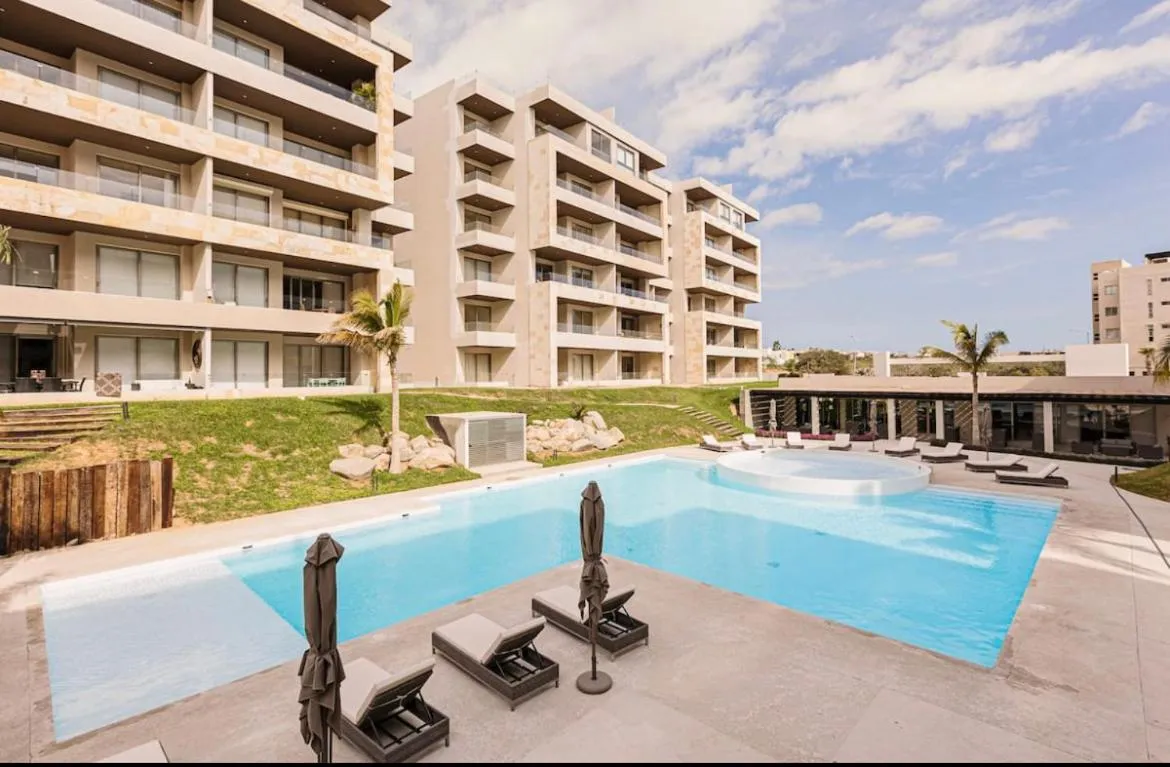 Swimming pool in Loft con balcón privado, estacionamiento gratis - Un oasis en Los Cabos