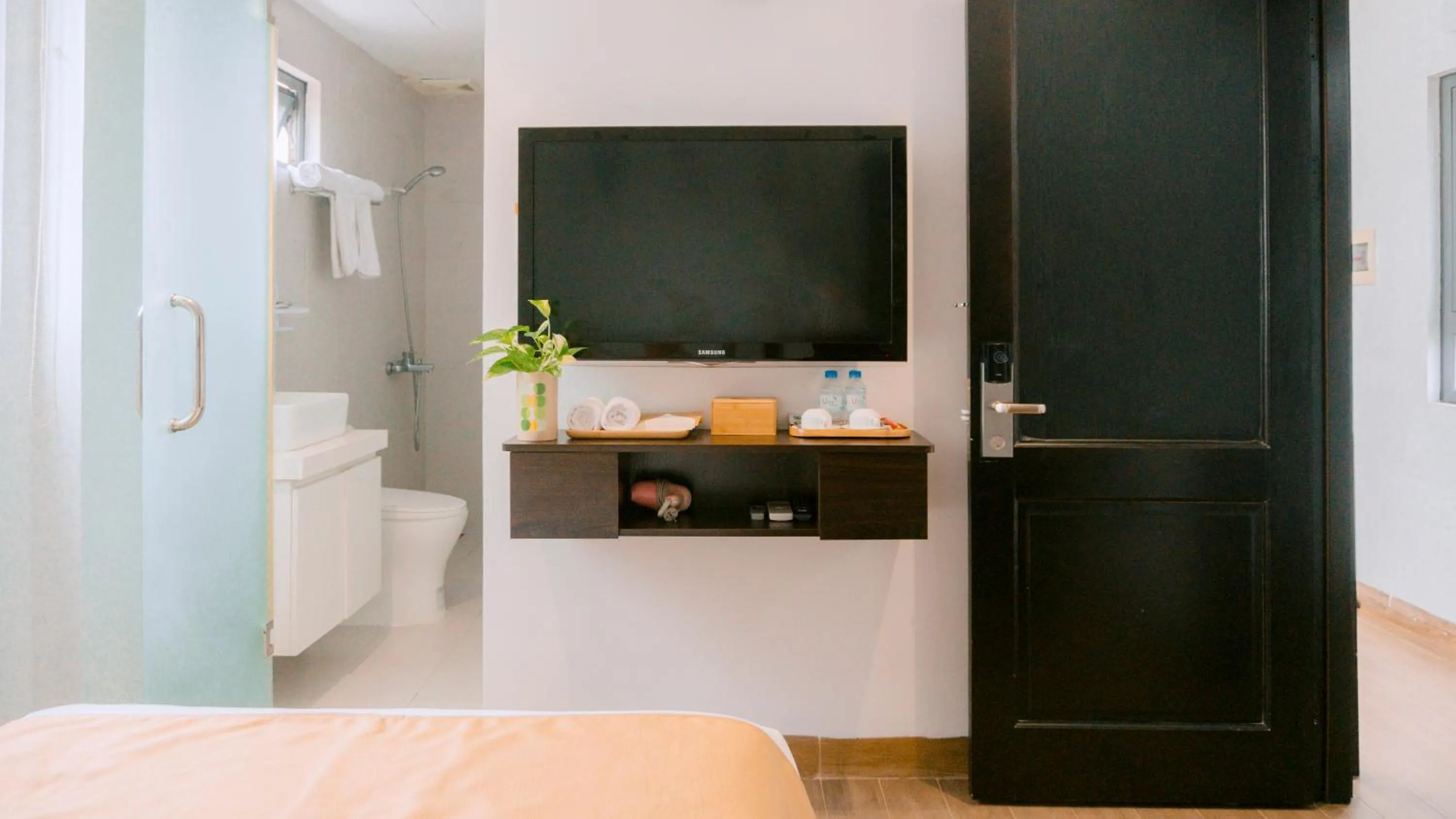 Shower, Bed in Horizon Front Beach Hotel Danang