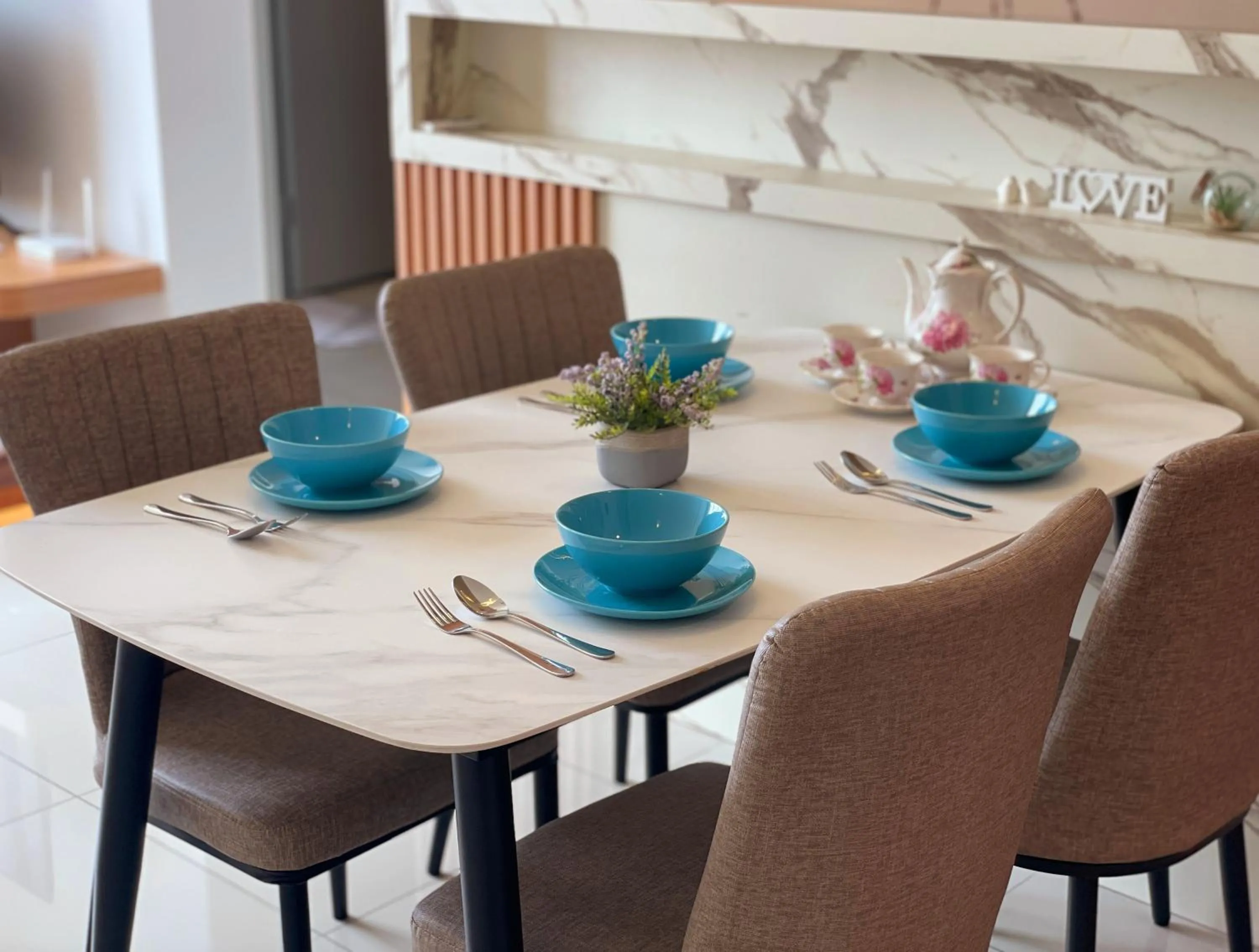 Dining area in Amber Cove Impression City Melaka By Dawn Stay Free Netflix