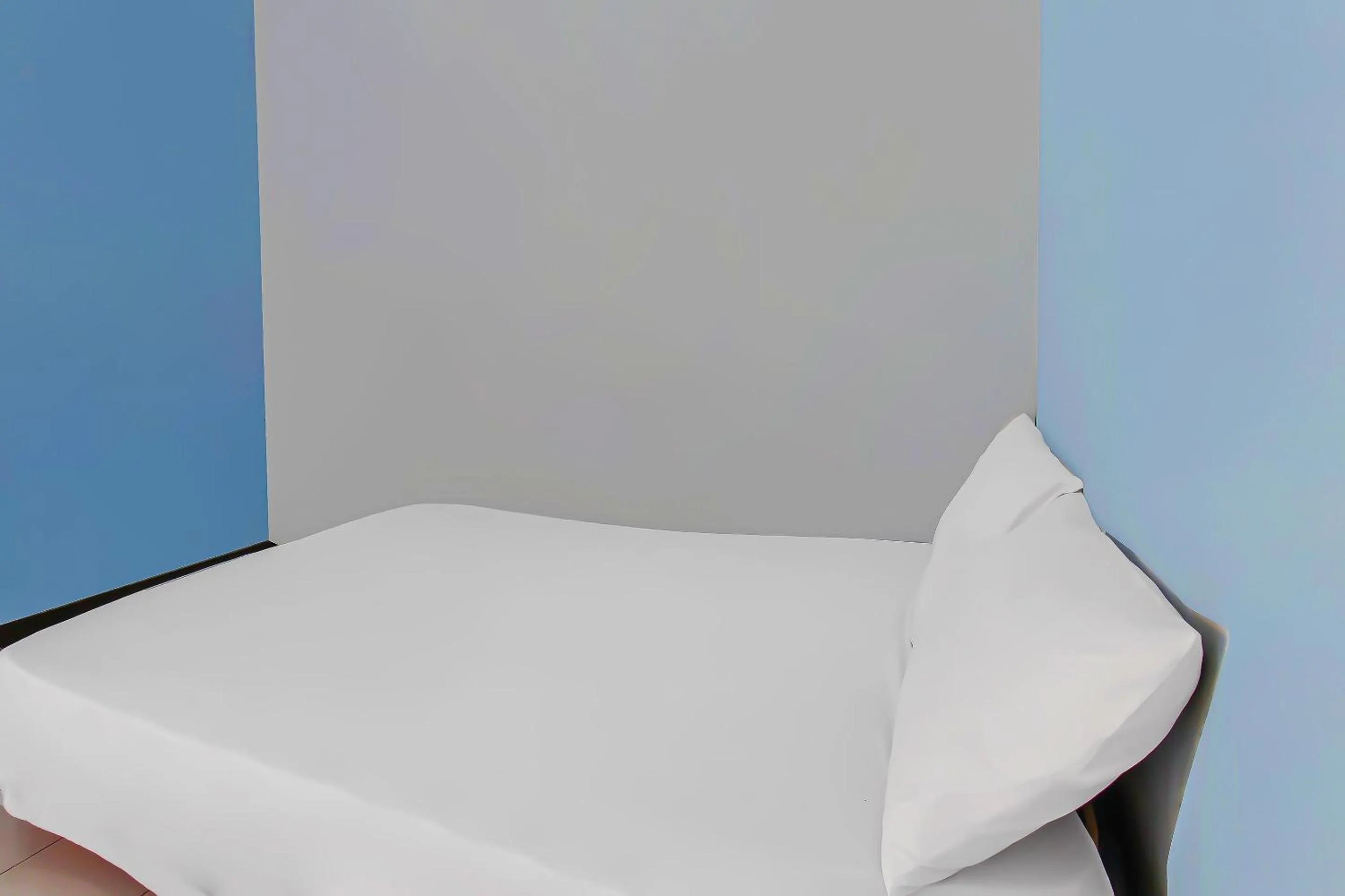 Bedroom in Hotel O Sukandi Homestay Near The Semeton Homestay