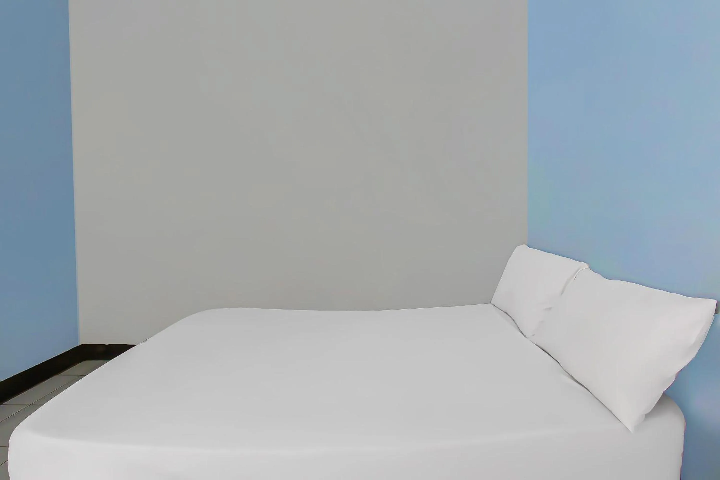 Bedroom in Hotel O Sukandi Homestay Near The Semeton Homestay