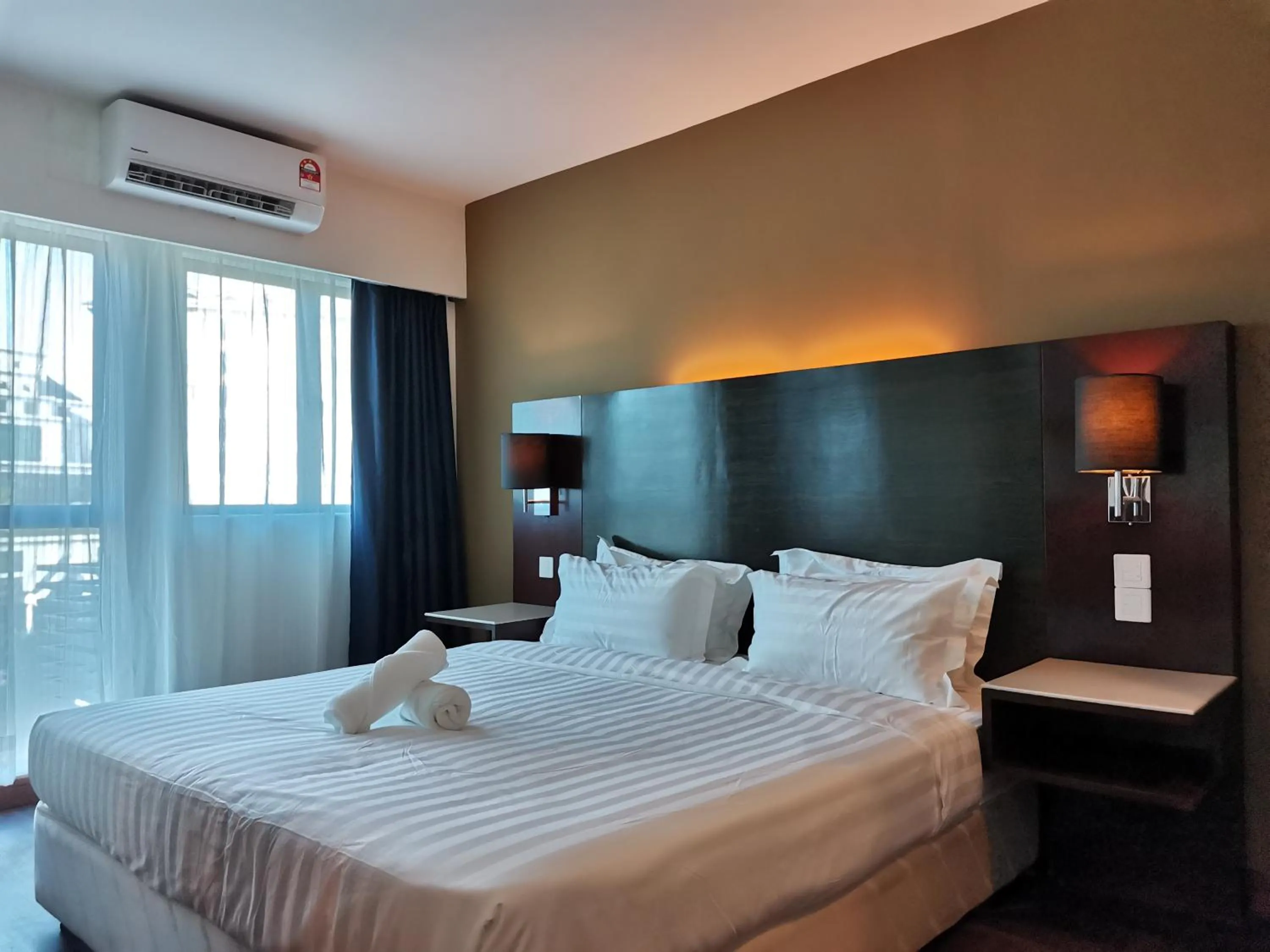 Bed in Greenage MingSuite 明绿时代套房 Kota Kinabalu 亚庇市中心