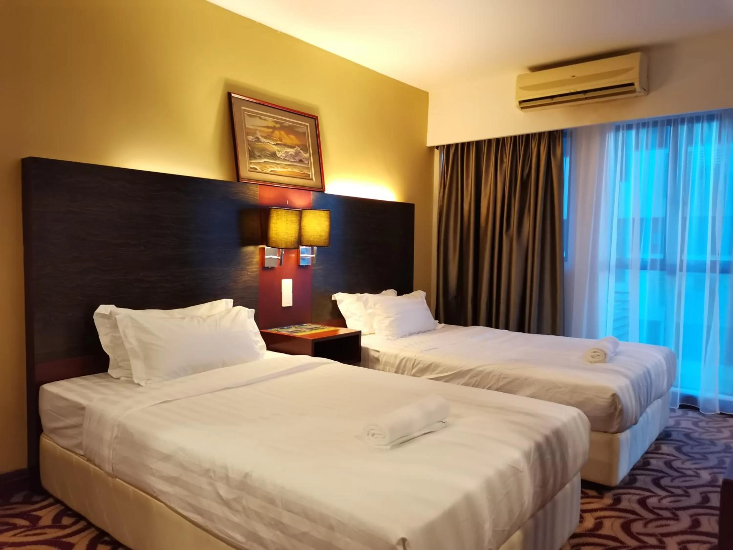 Bed in Greenage MingSuite 明绿时代套房 Kota Kinabalu 亚庇市中心