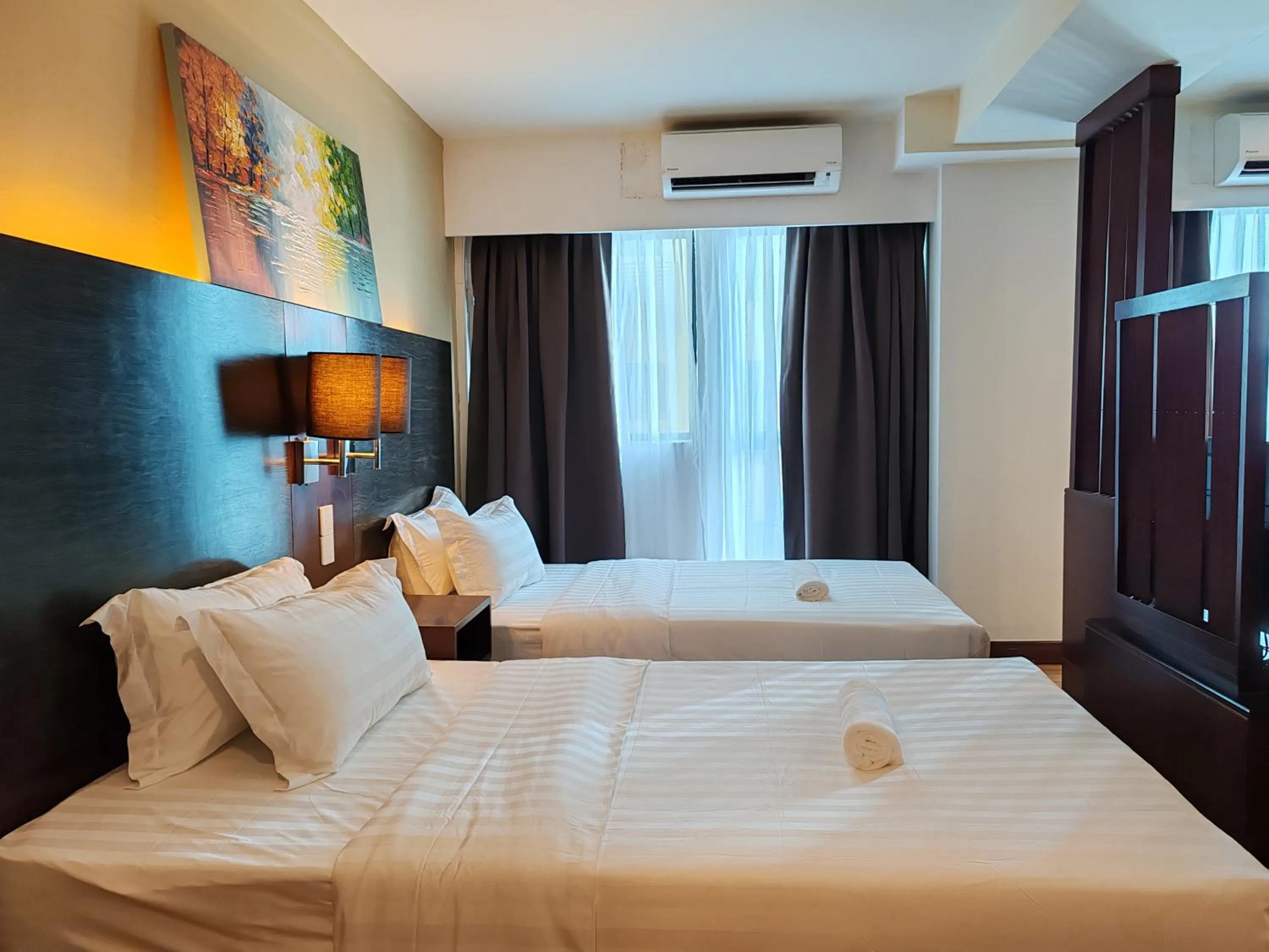 Bed in Greenage MingSuite 明绿时代套房 Kota Kinabalu 亚庇市中心