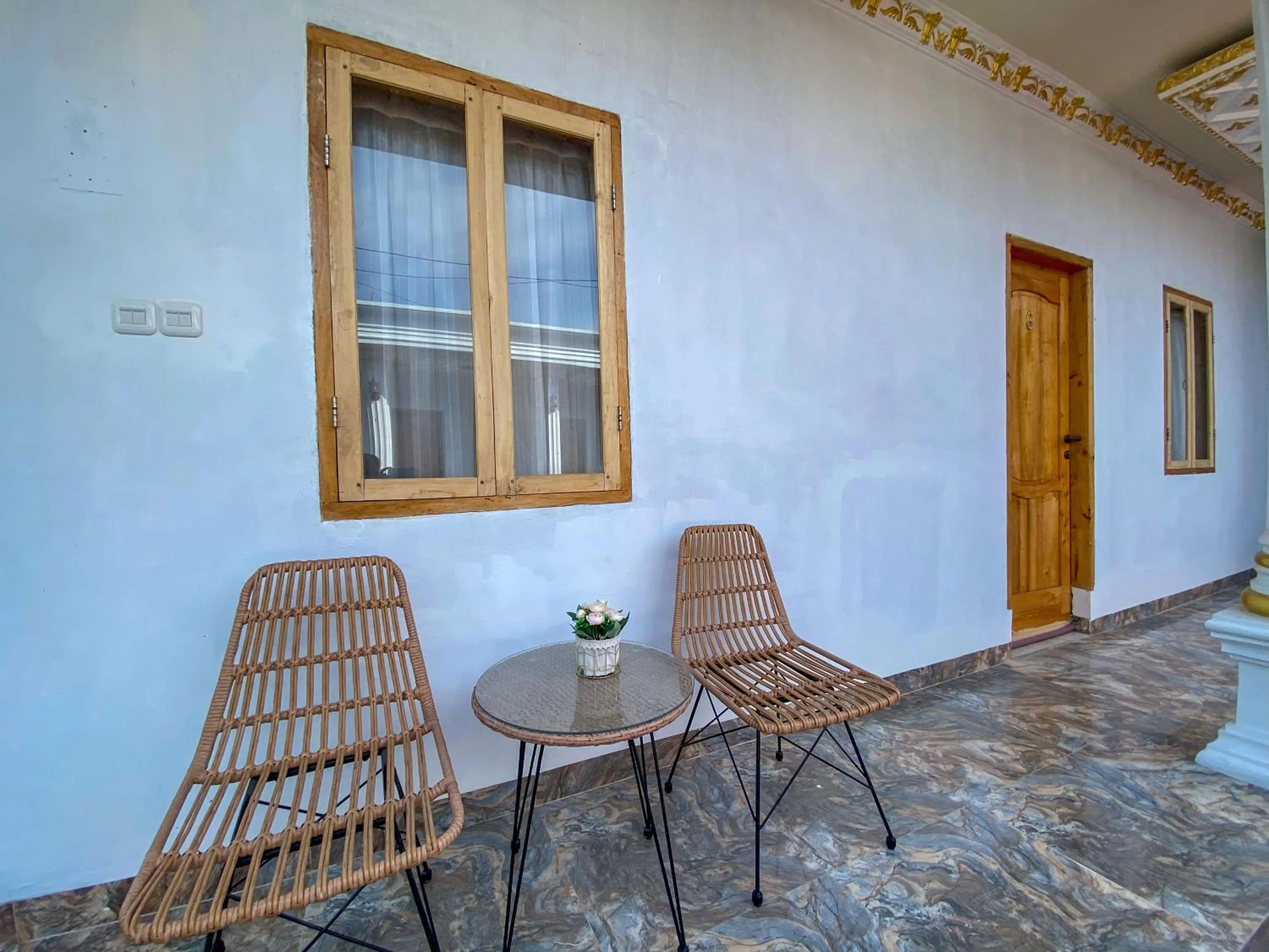 Seating area in Rumah Windy Guest House Bira