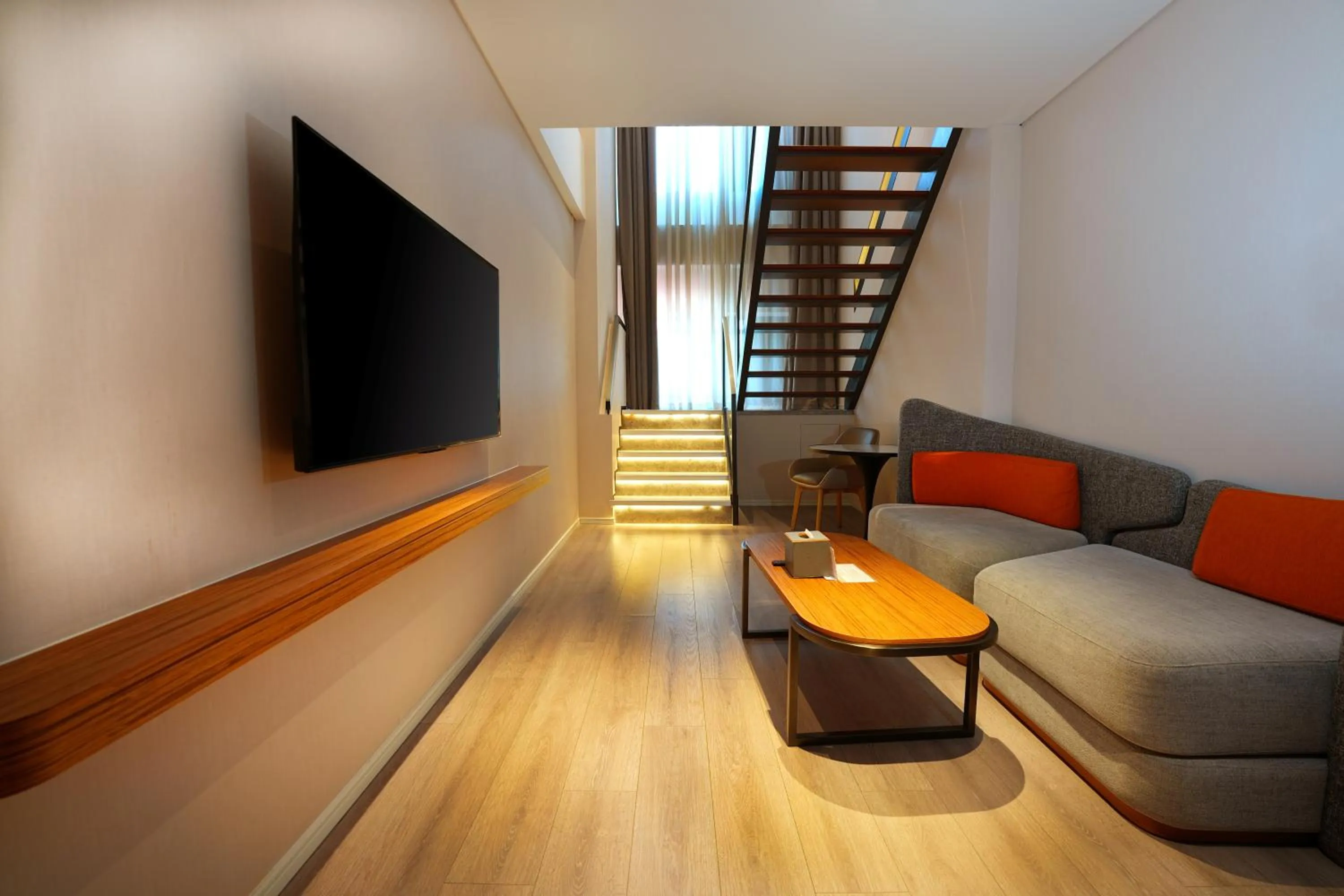 Living room in UrCove by Hyatt Shanghai Lujiazui Expo Center