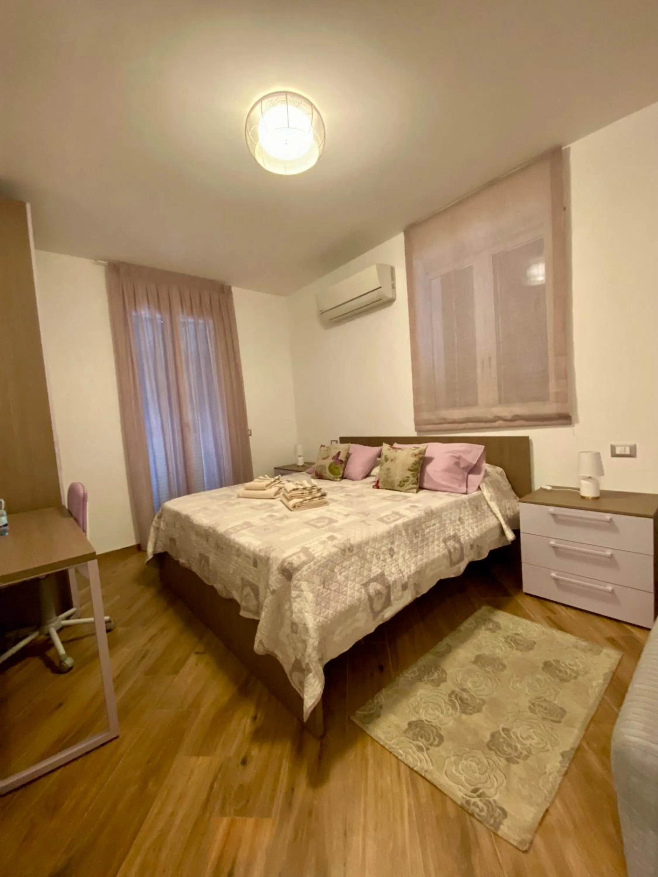 Bed in Holiday Rooms La Campagnetta