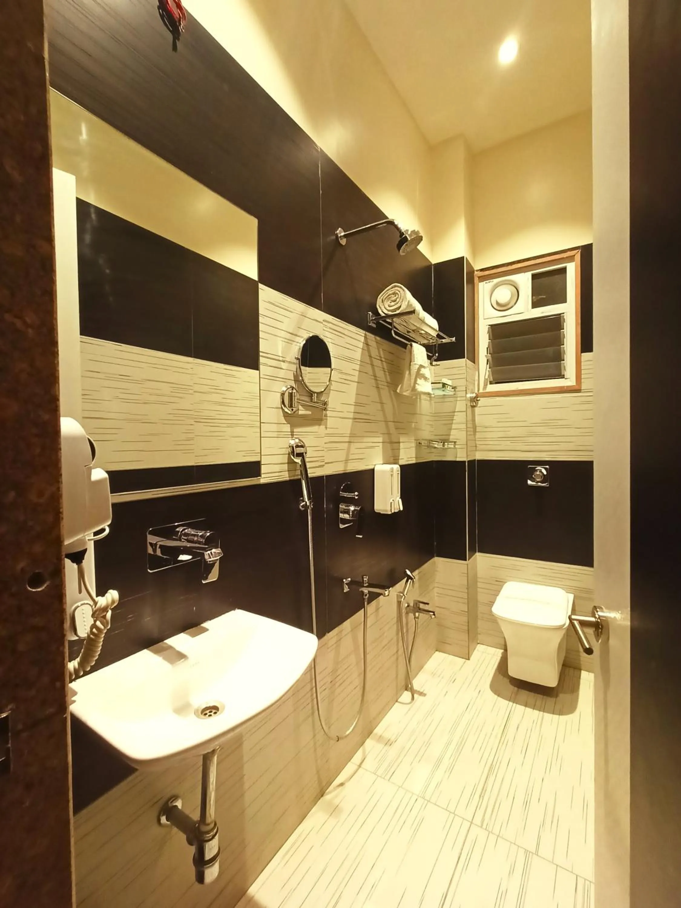 Toilet in Radhamangal Colors Inn