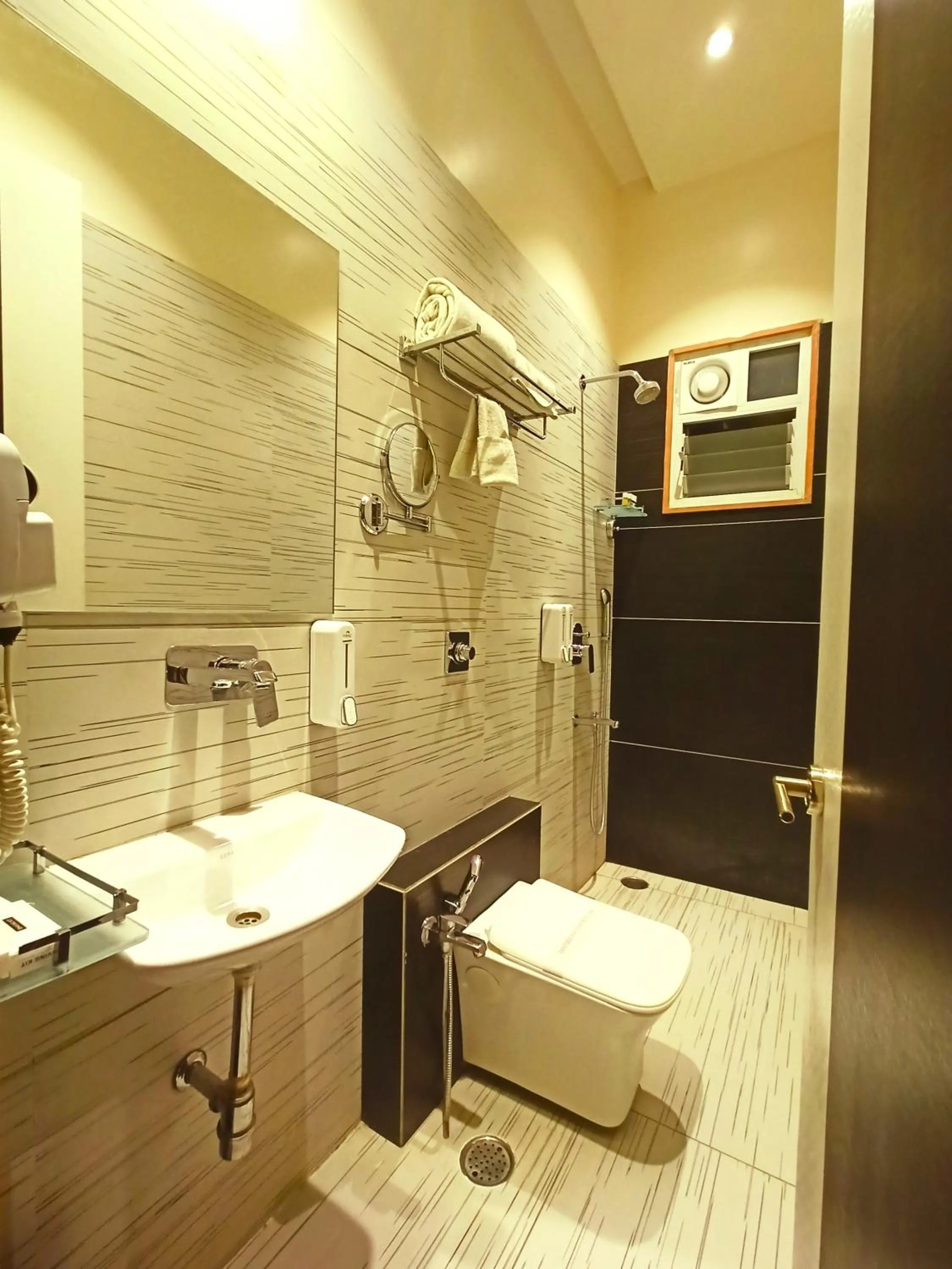 Toilet in Radhamangal Colors Inn