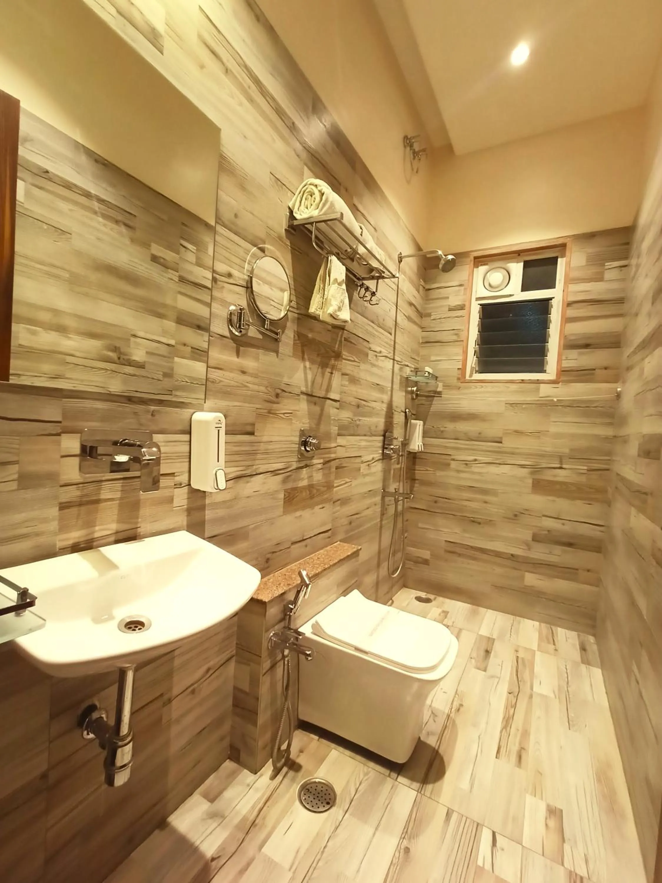 Toilet in Radhamangal Colors Inn