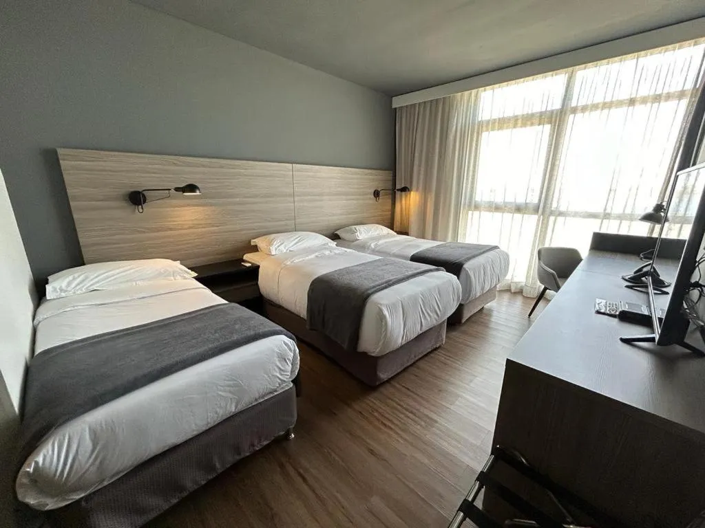 Bed in Midland Hotel & Resort All Inclusive