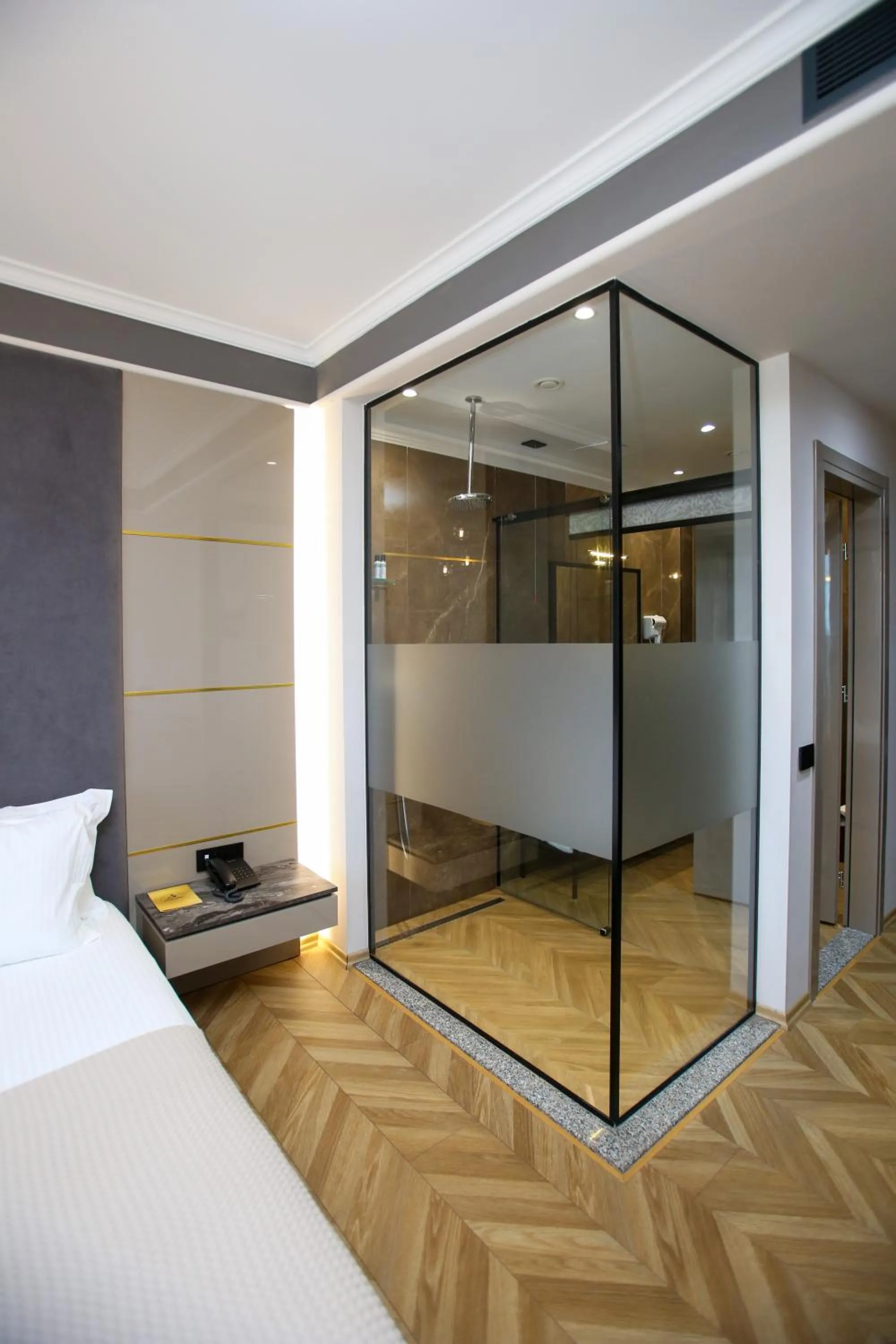 Bed in Belvedere Hotel & SPA