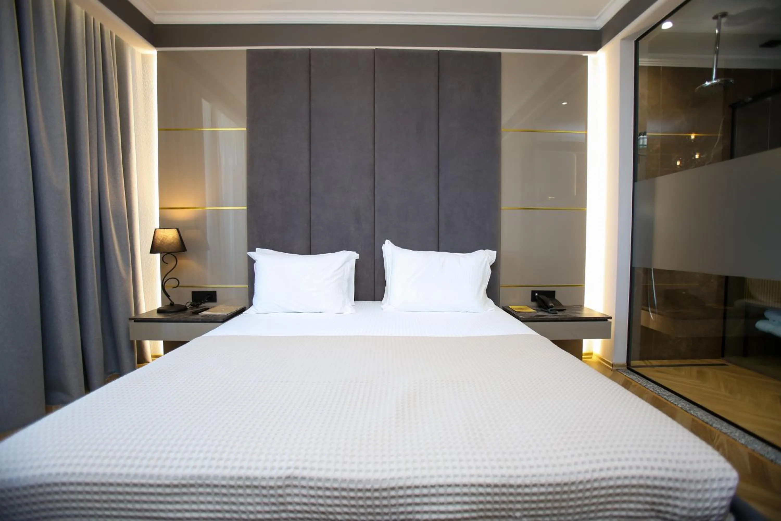 Bed in Belvedere Hotel & SPA