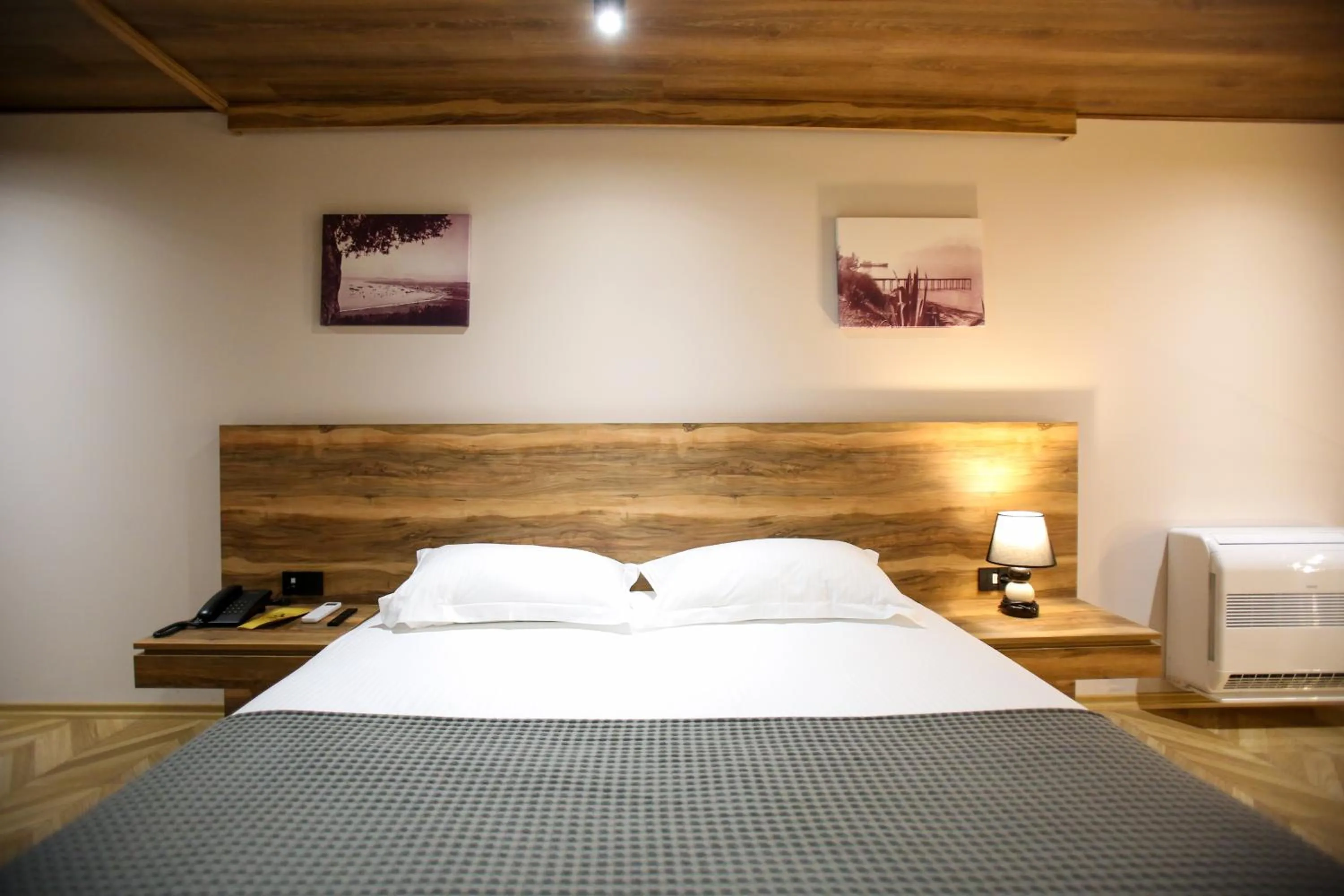 Bed in Belvedere Hotel & SPA