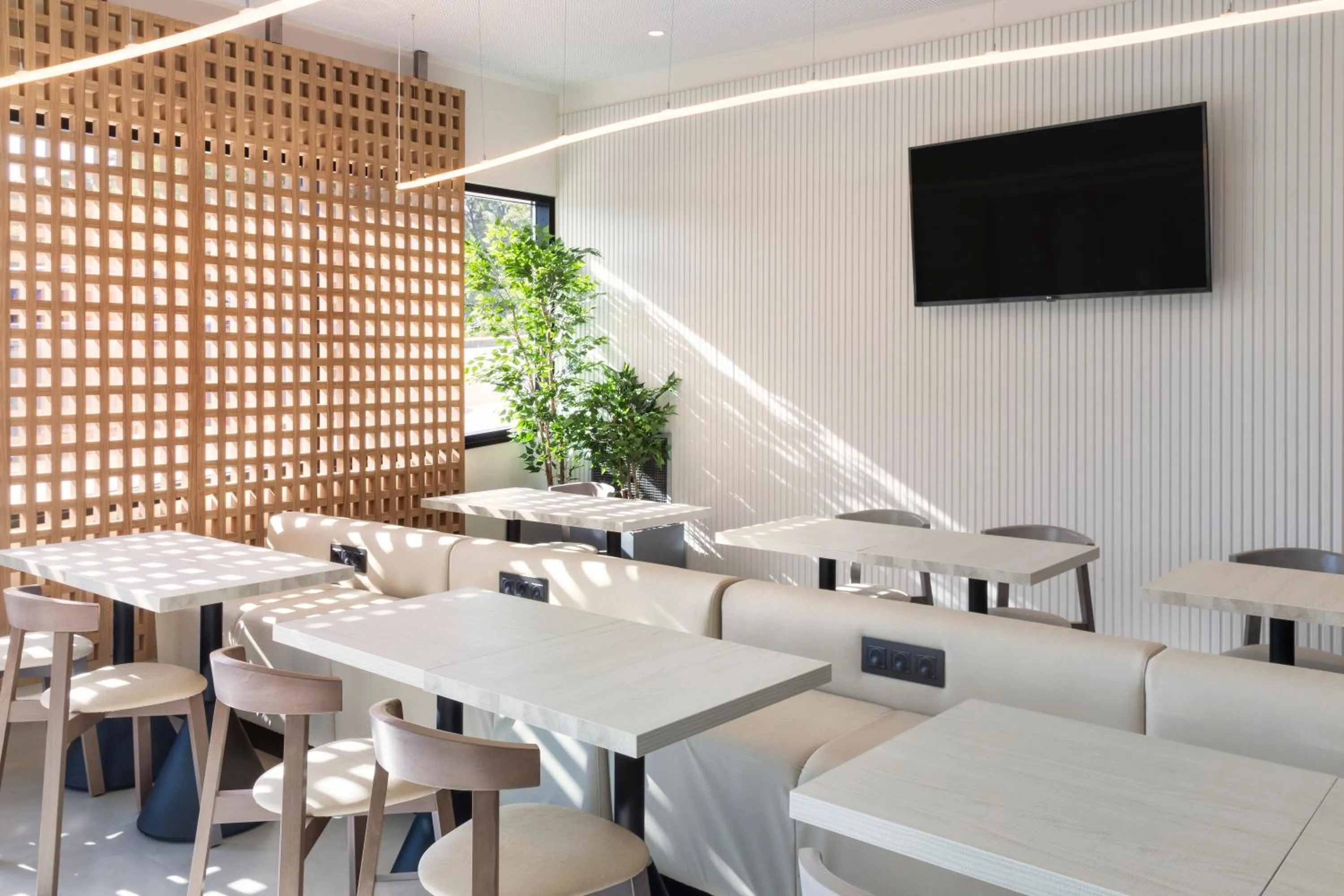 Seating area in B&B HOTEL Guimarães