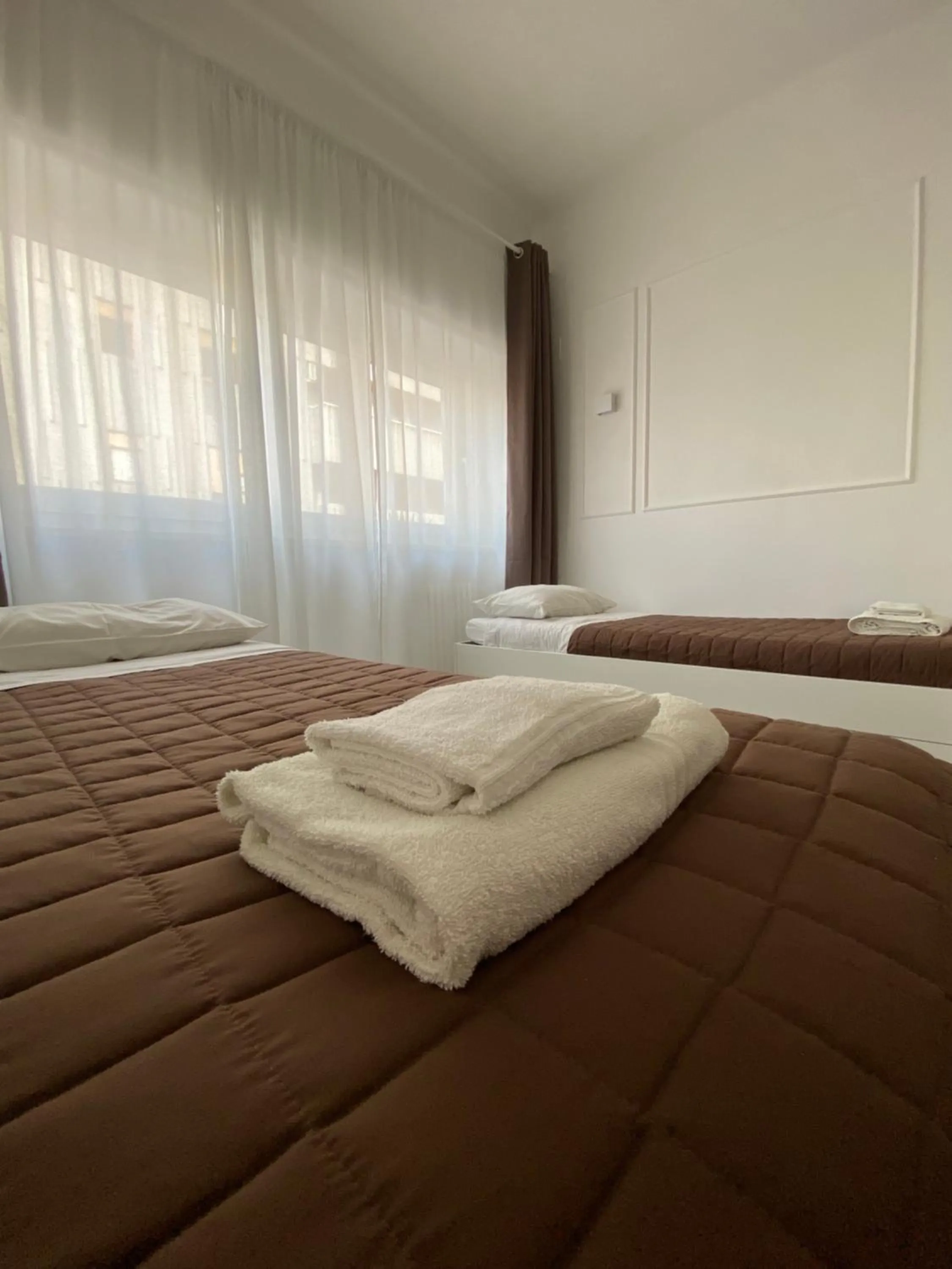 Bed in Quintino Sella rooms