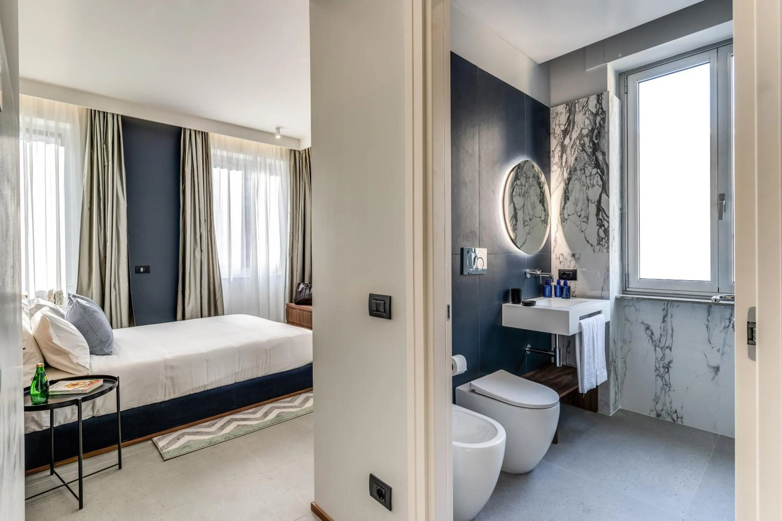 Photo of the whole room, Bed in Sospeso Boutique Hotel