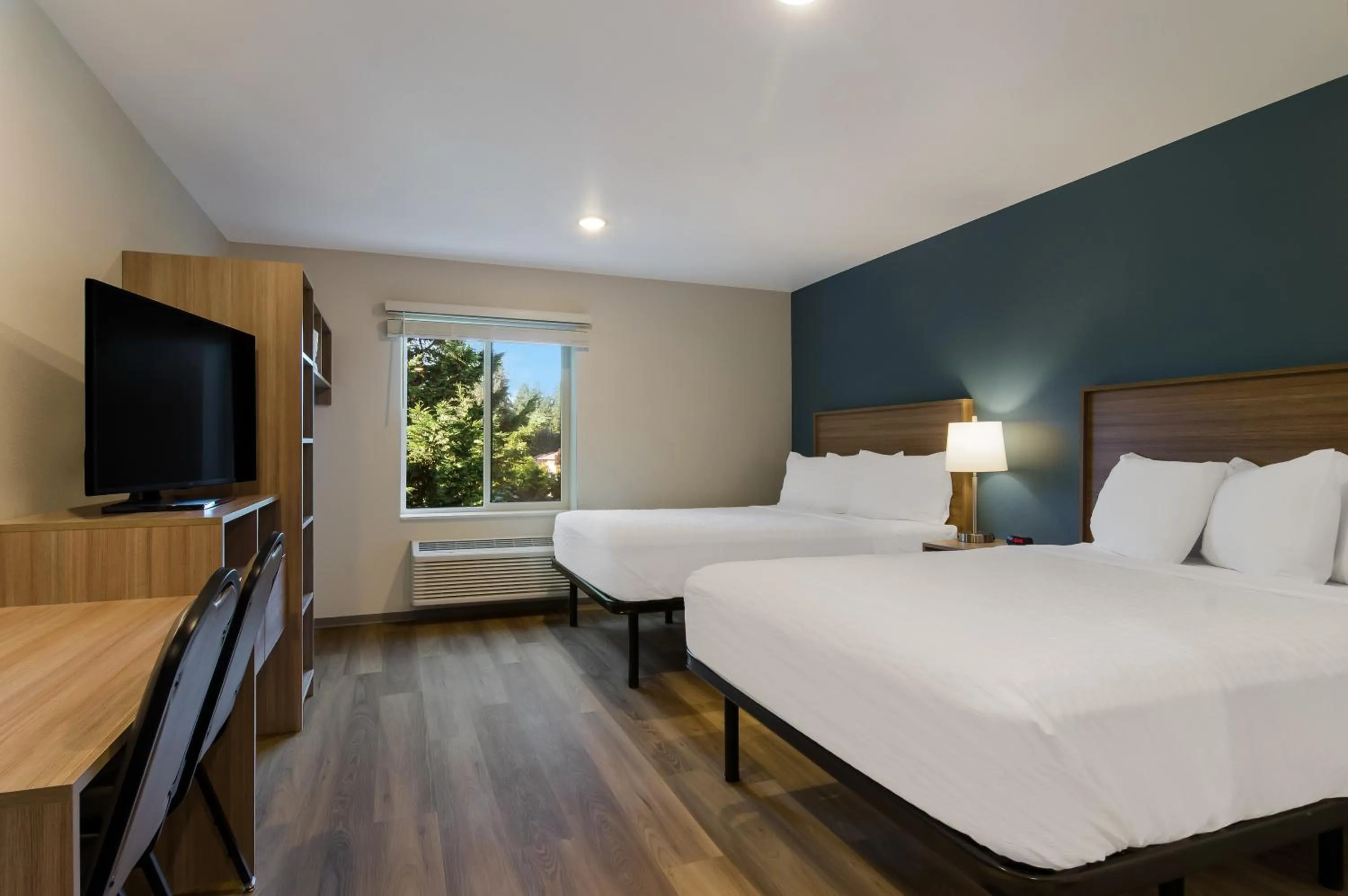 Bedroom, Bed in WoodSpring Suites Olympia - Lacey