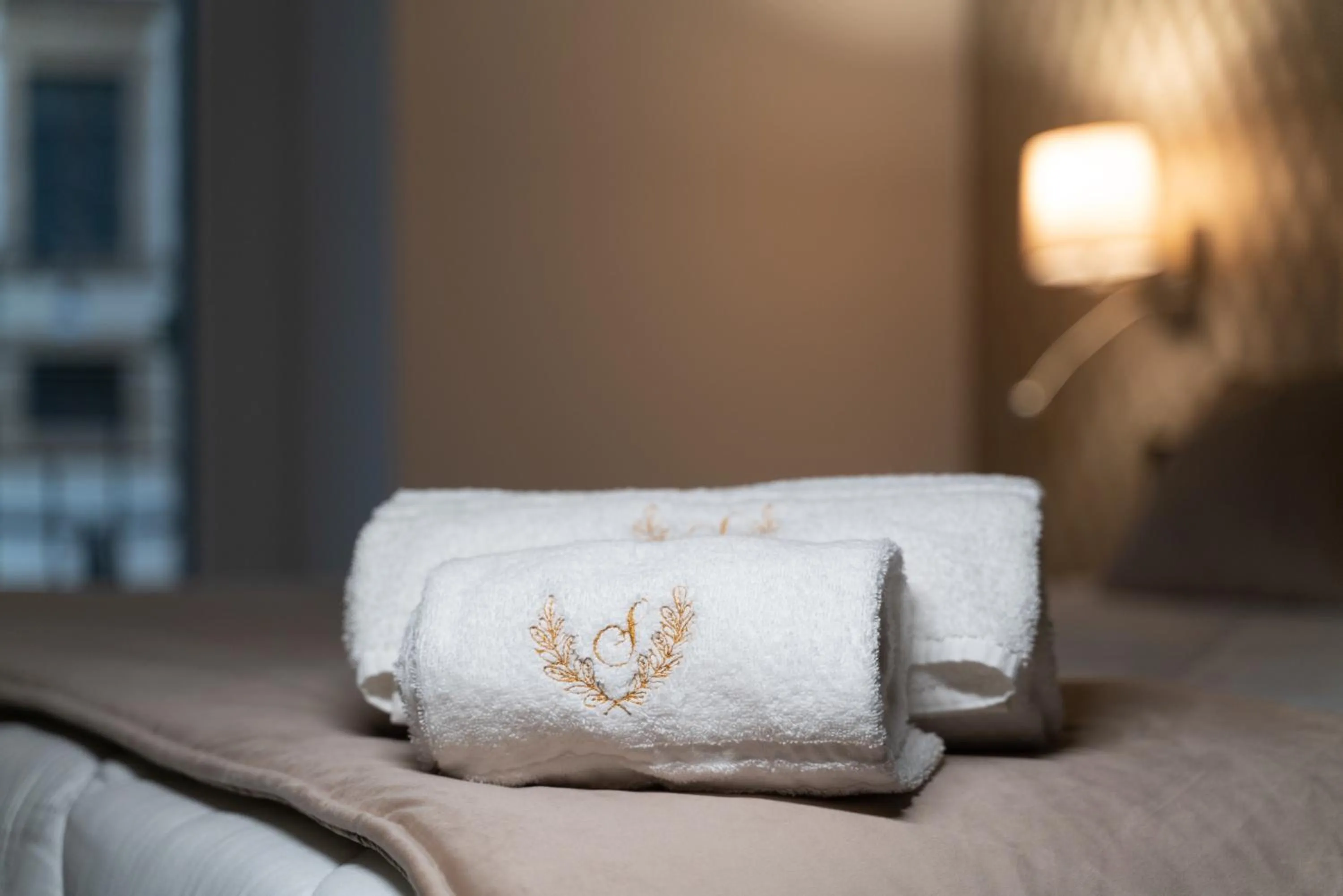 towels, Bed in Sofi' Center Rooms