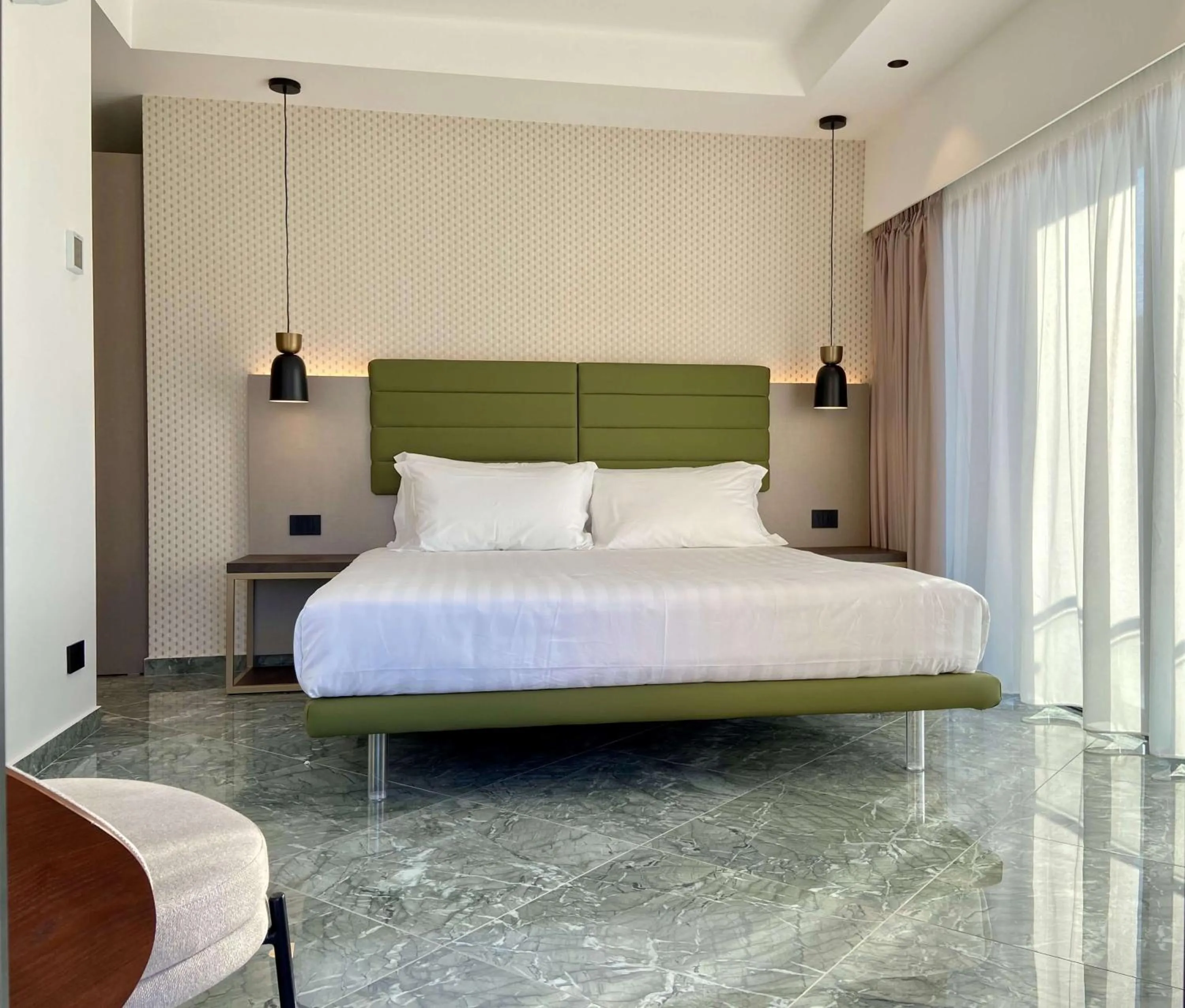 Bed in Salemare Rooms & Suites