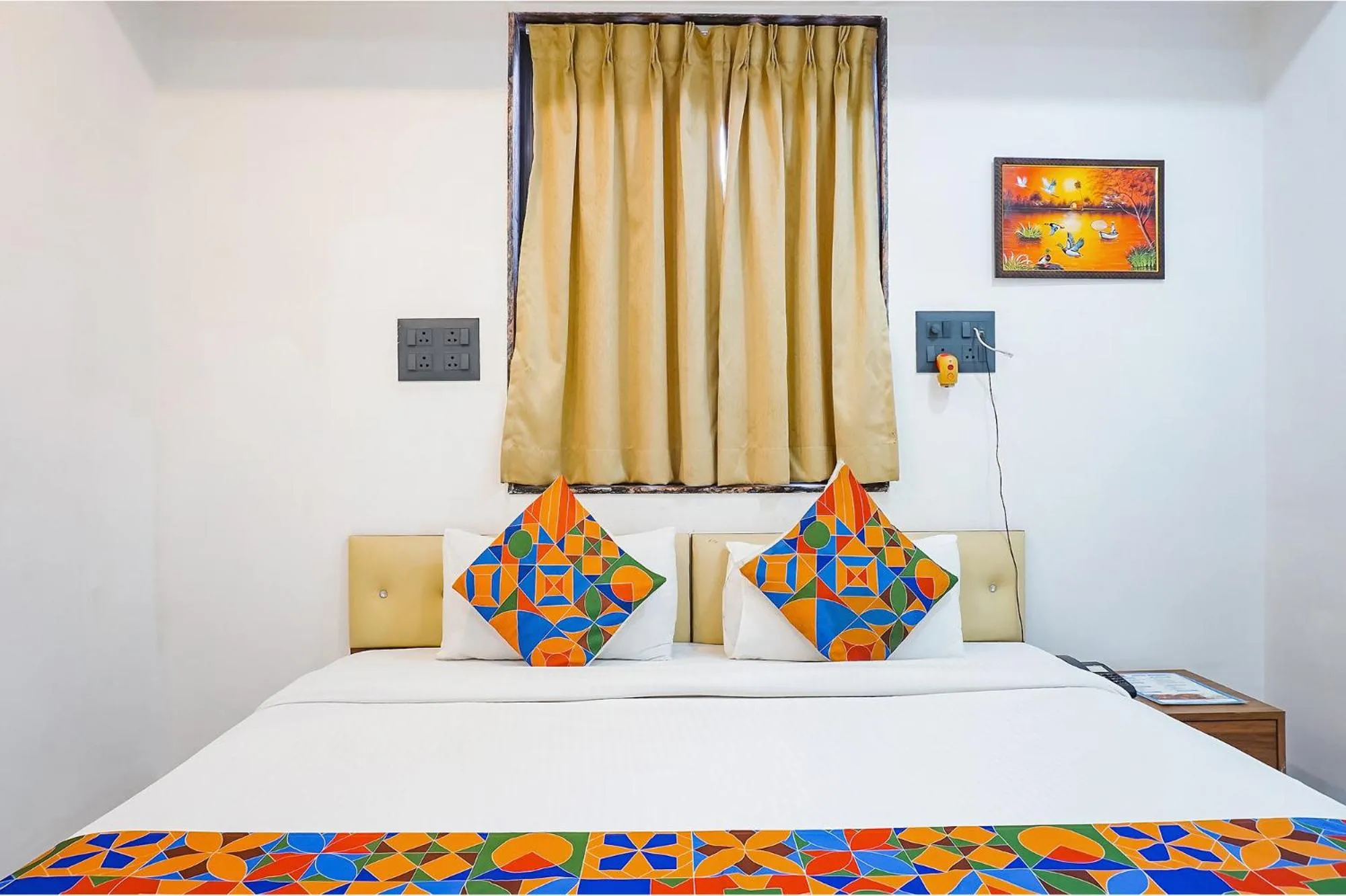 Bed in FabHotel Atithi Regency