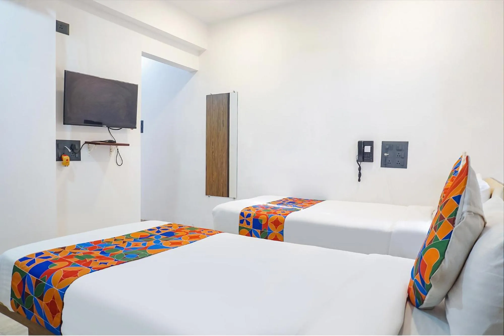 Bed in FabHotel Atithi Regency
