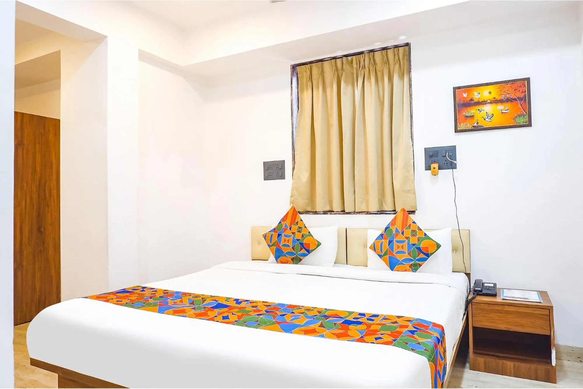 Bed in FabHotel Atithi Regency