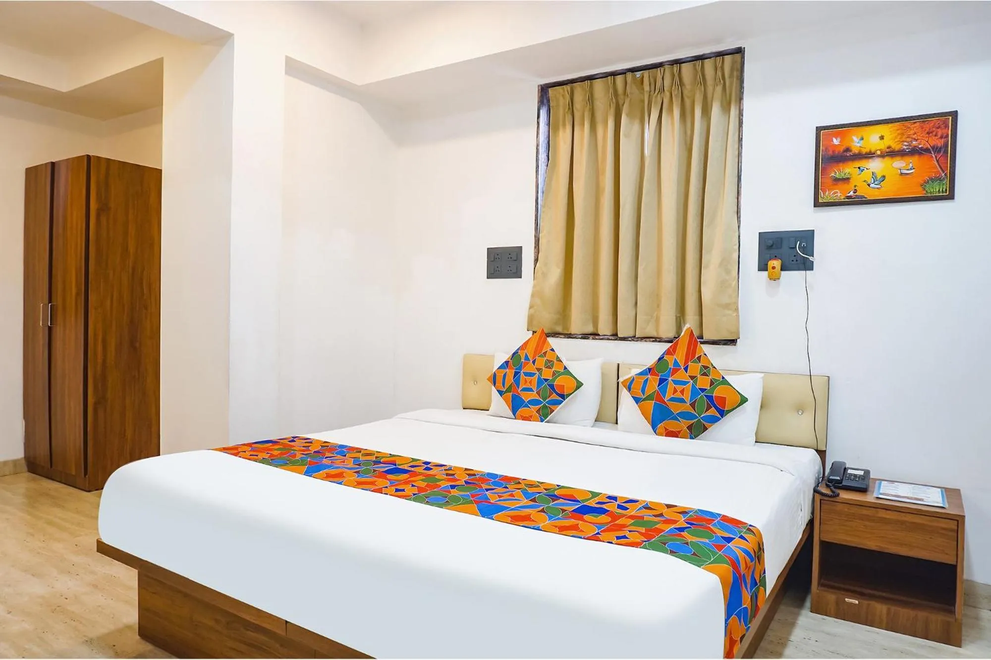 Bed in FabHotel Atithi Regency