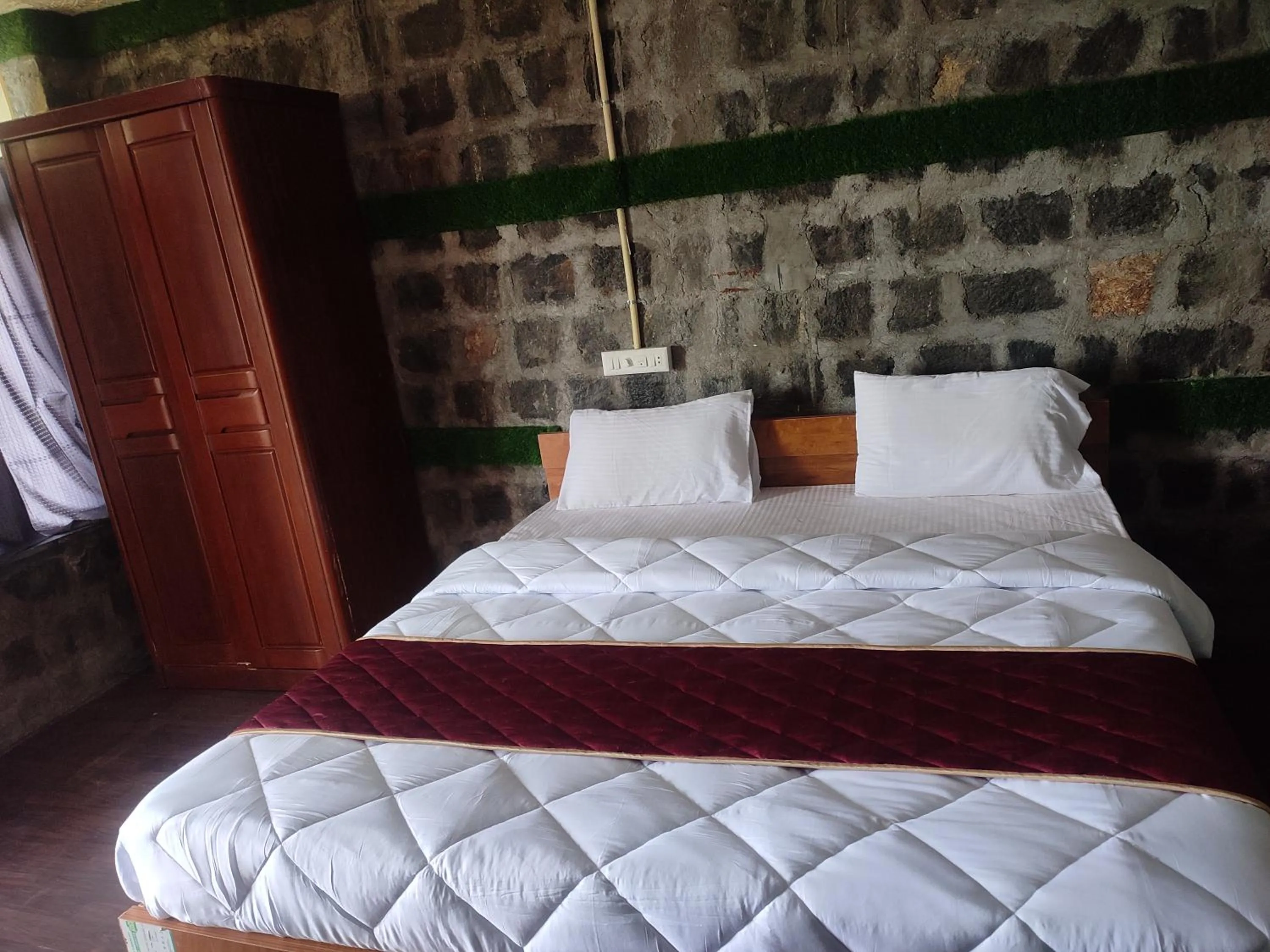 Bed in Cholai Resorts & Hotels