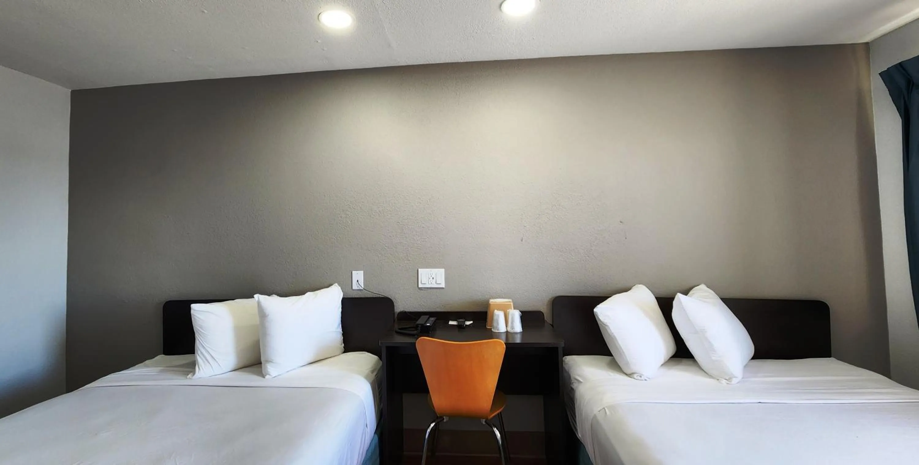 Bed in Studio 6 Webster TX Houston NASA Lake