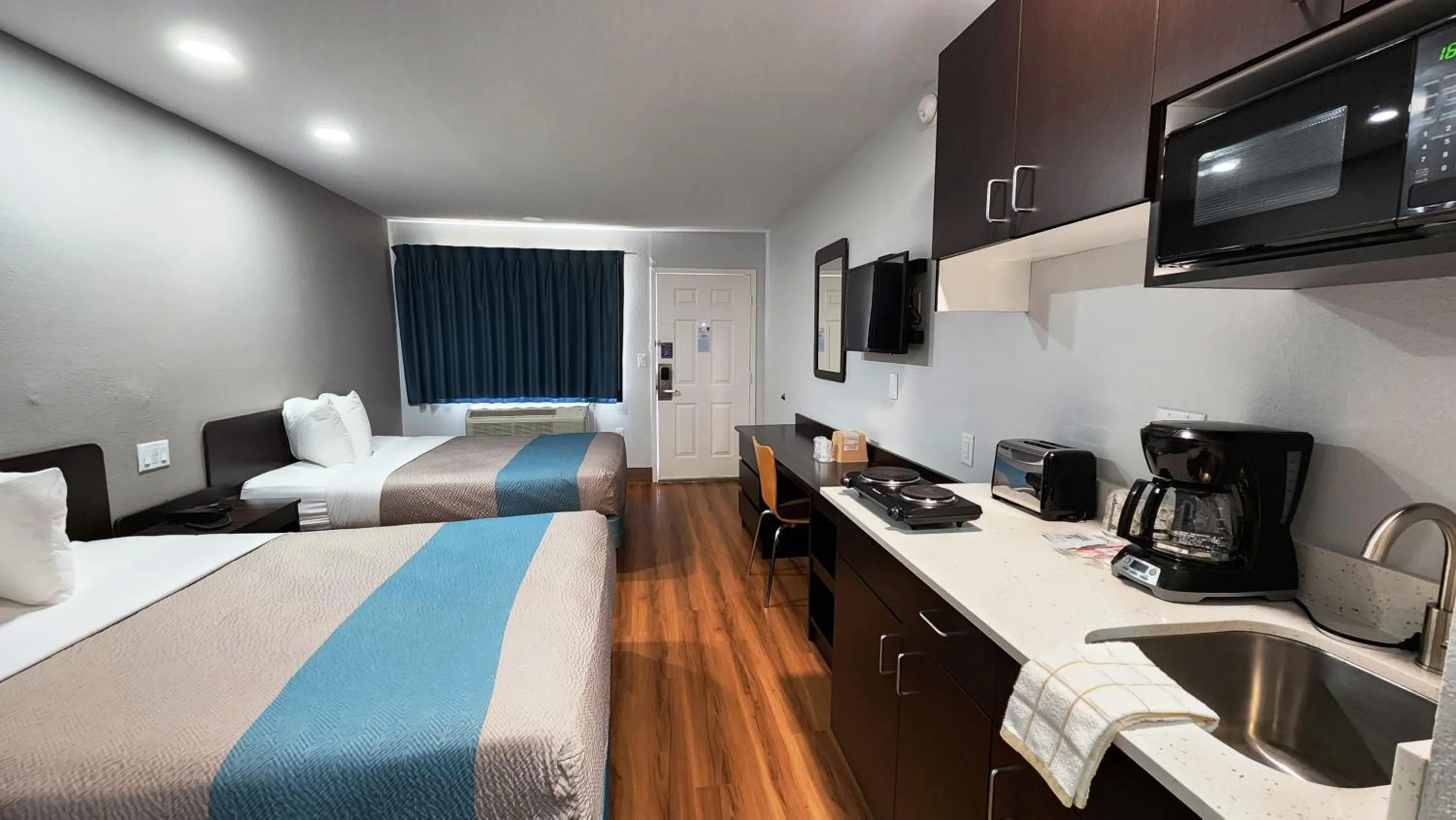 Bed in Studio 6 Webster TX Houston NASA Lake