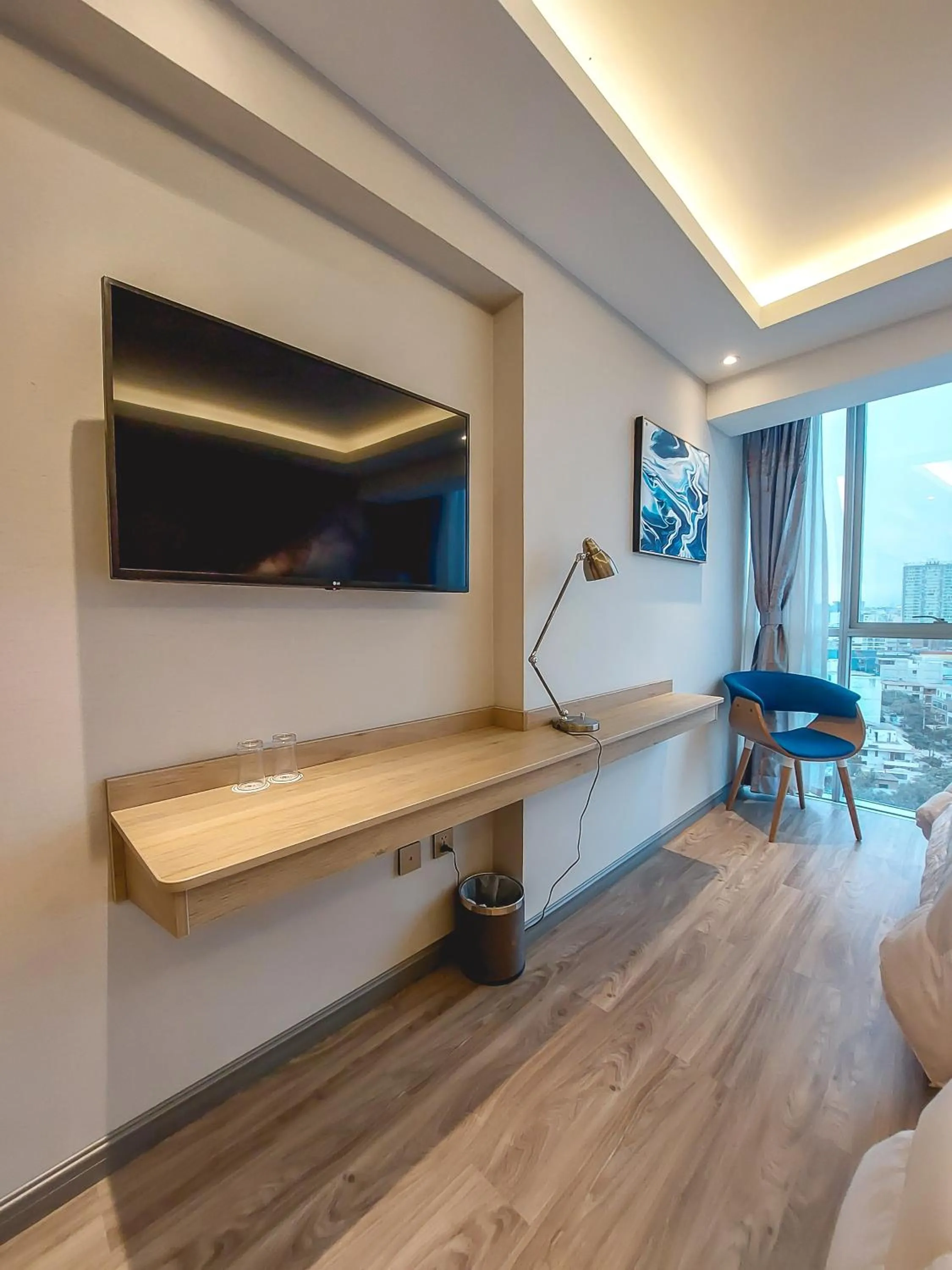 Communal lounge/ TV room in Gold Source Hotel